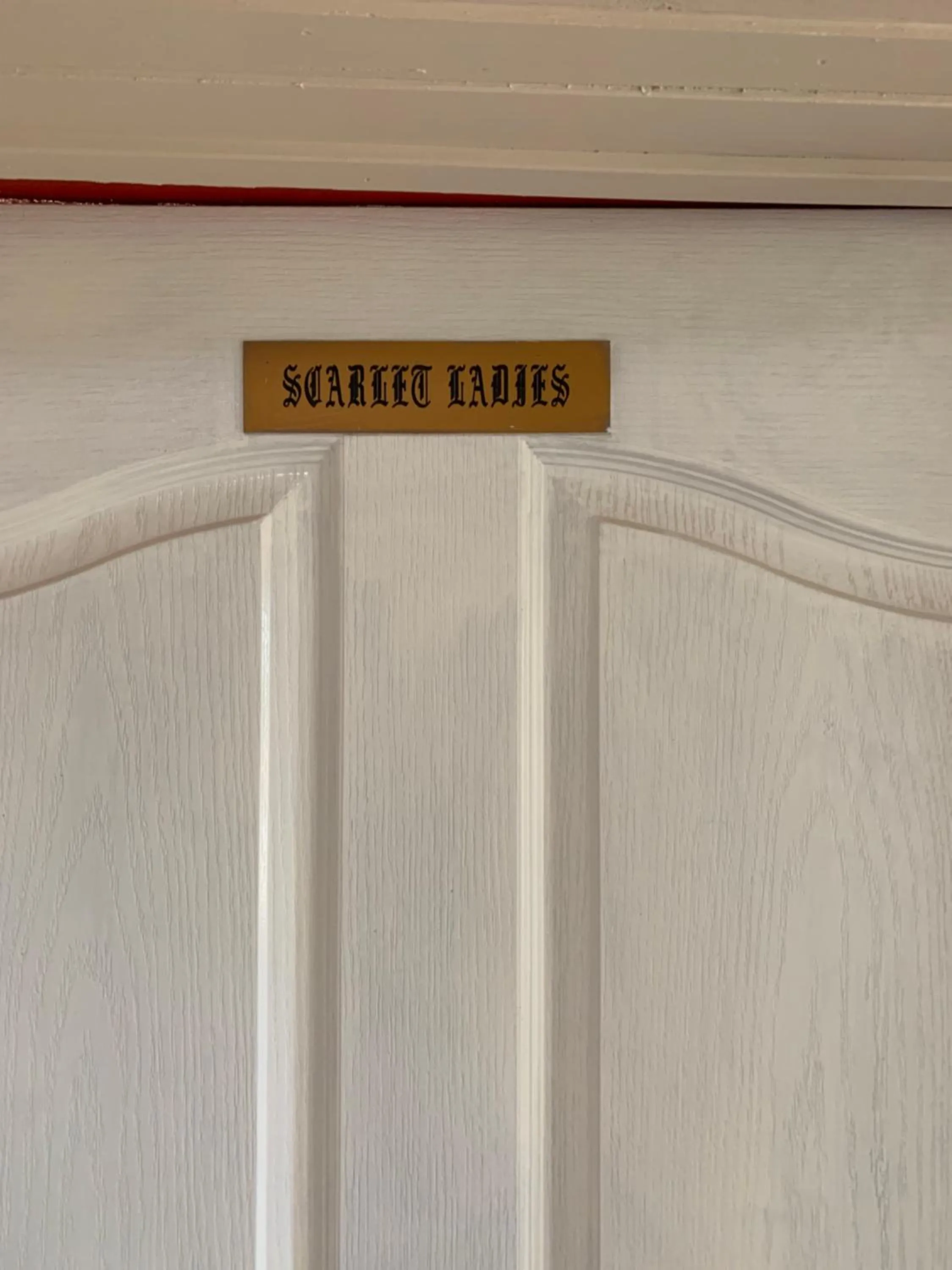 Text overlay in Tombstone Bordello Bed & Breakfast