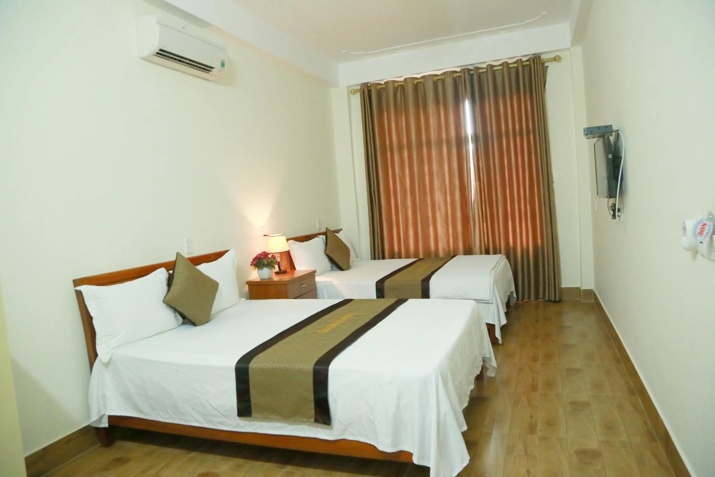 Bed in Gold Plus Hotel