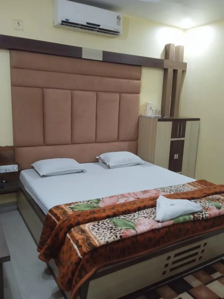 Bed in Hotel Srikrishna International