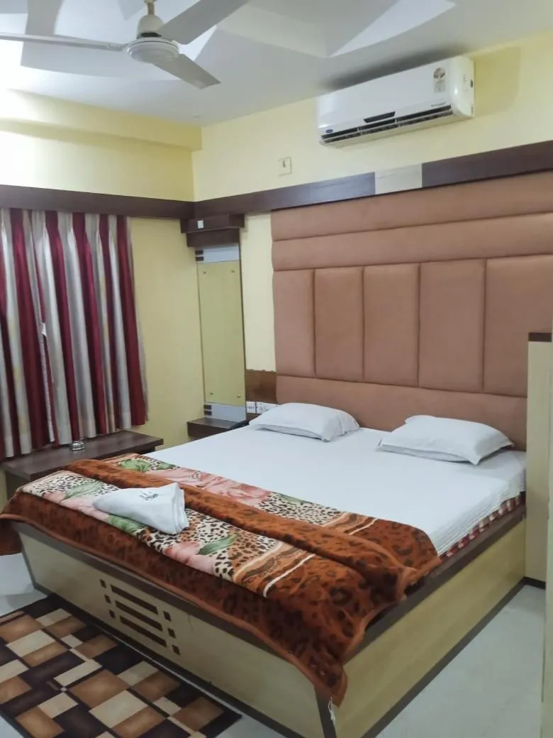 Bed in Hotel Srikrishna International