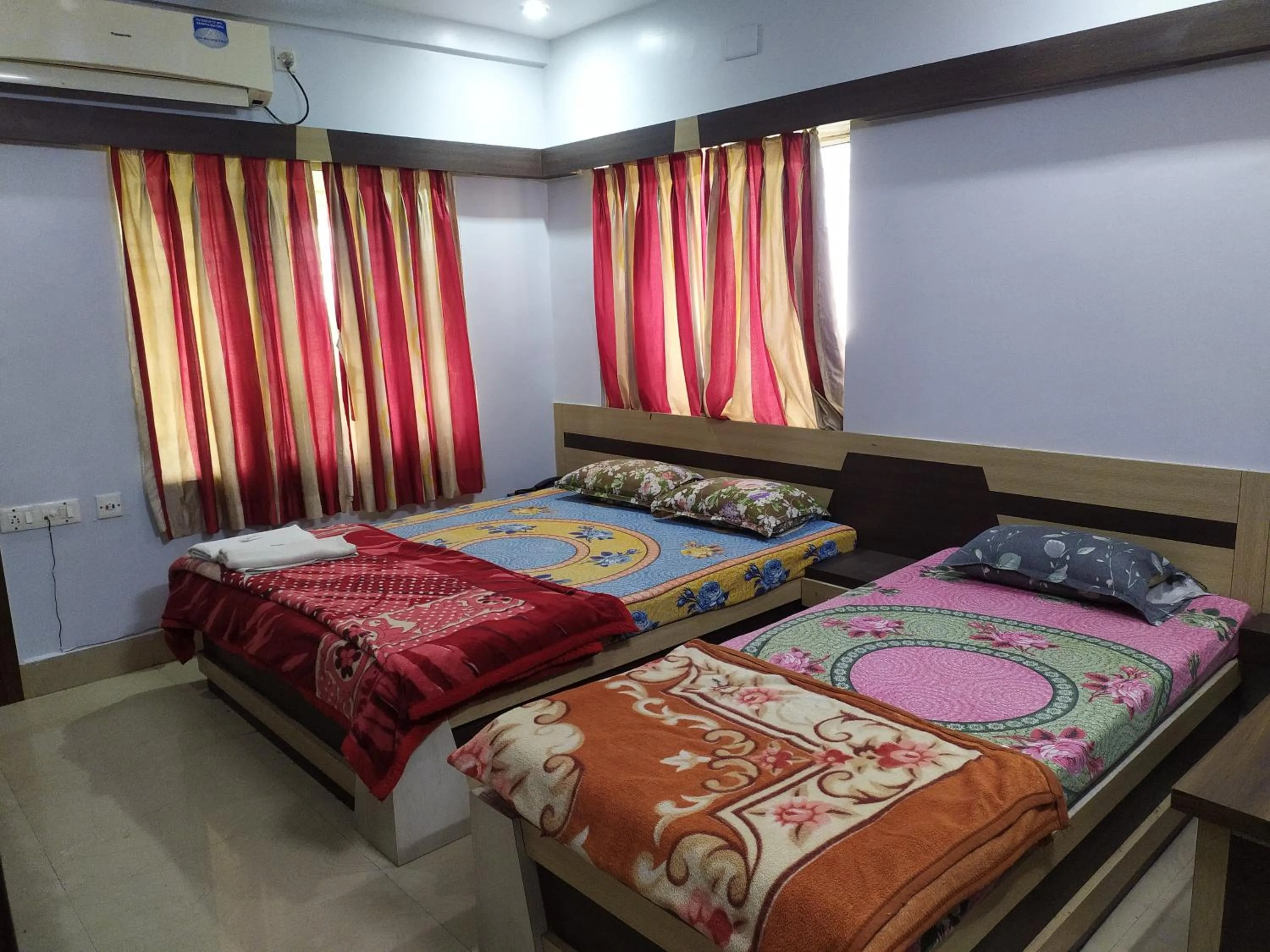 Bed in Hotel Srikrishna International