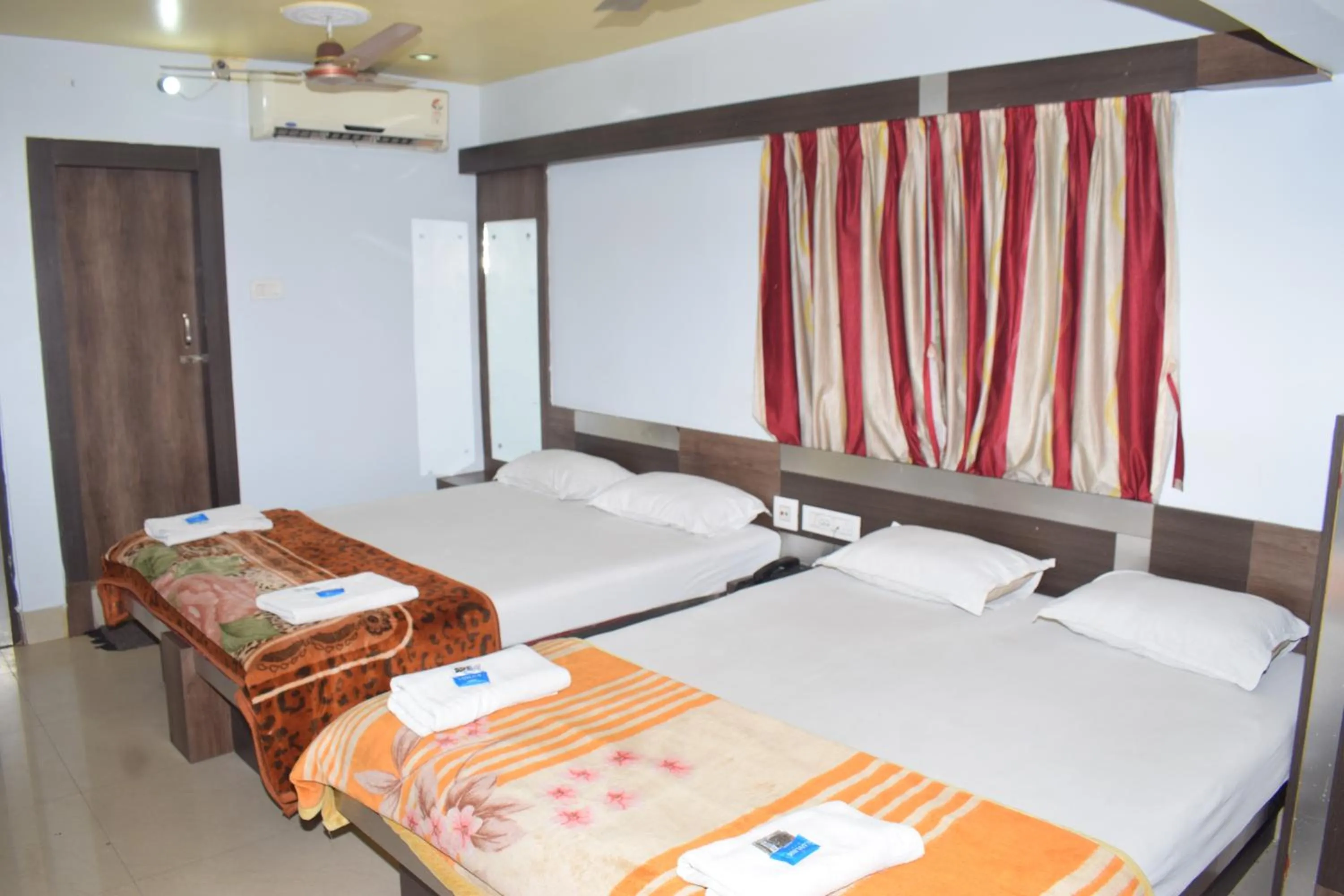 Bed in Hotel Srikrishna International