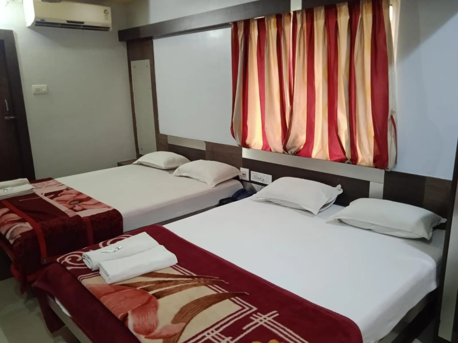 Bed in Hotel Srikrishna International