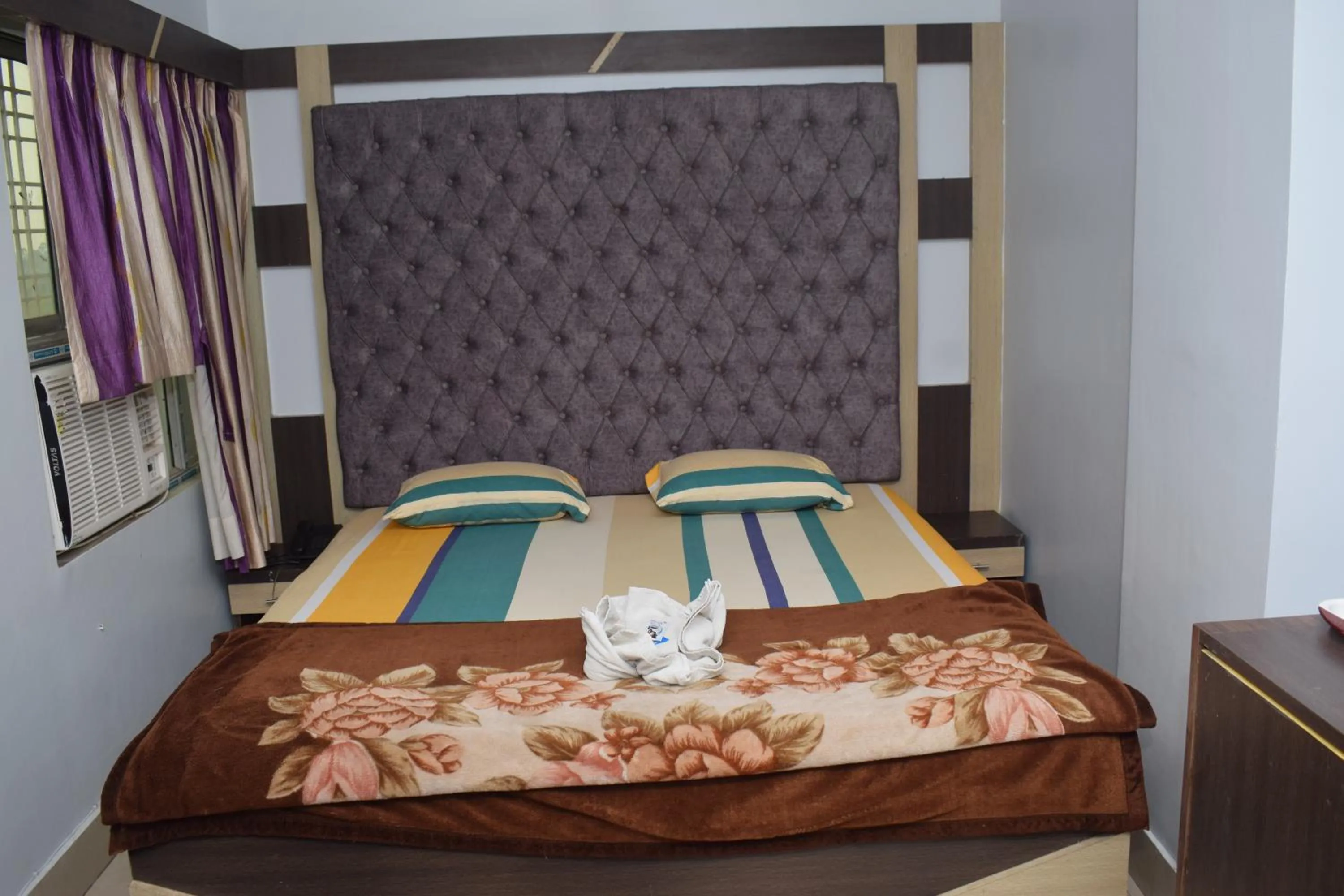 Bed in Hotel Srikrishna International
