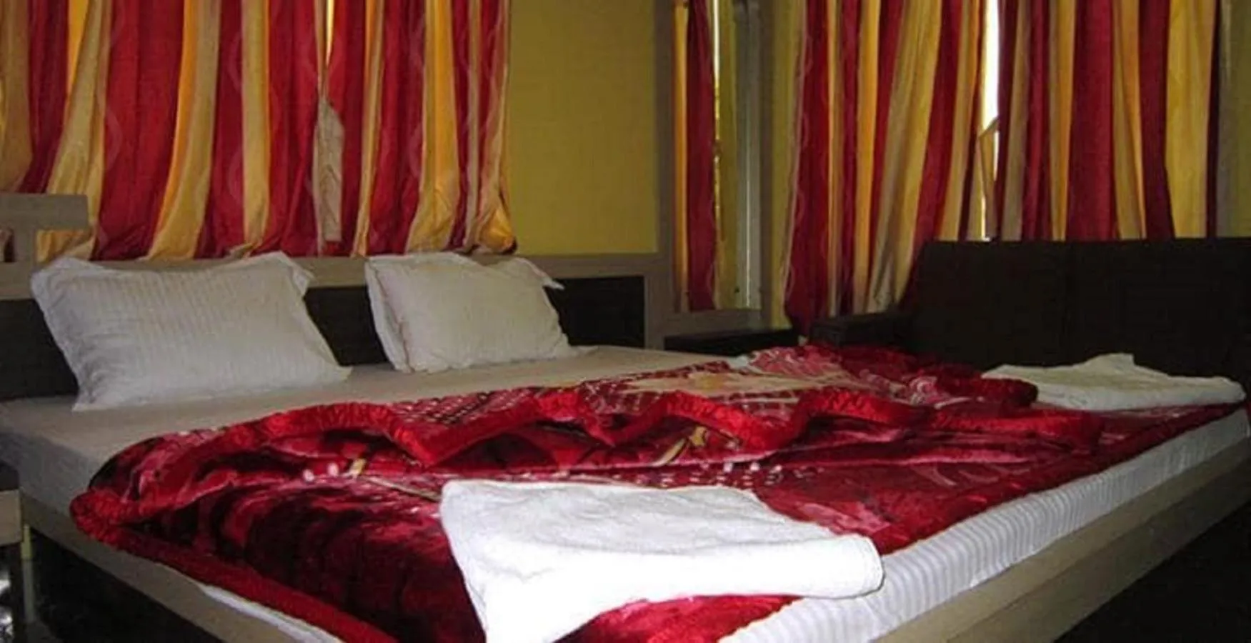 Bed in Hotel Srikrishna International