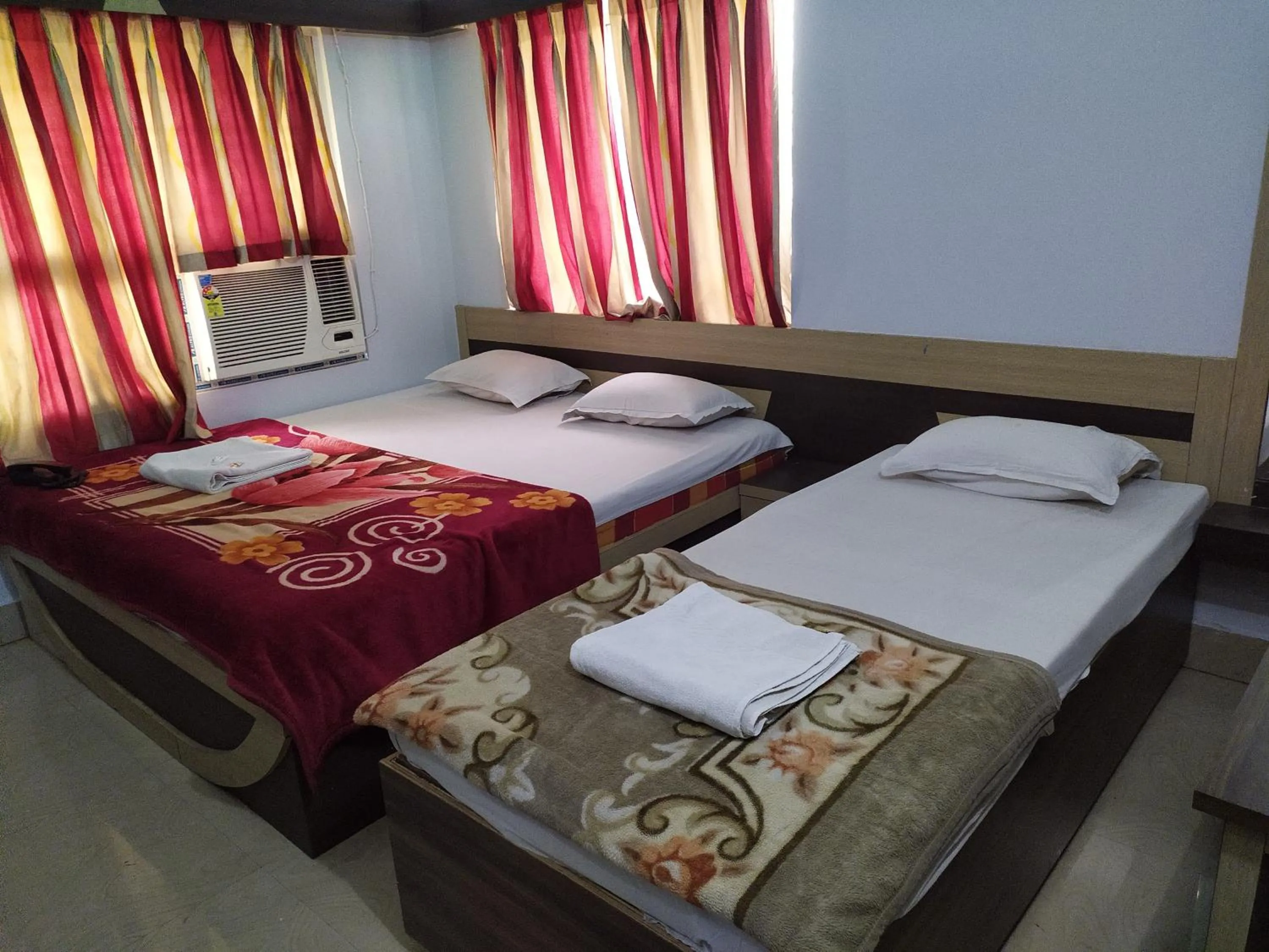 Bed in Hotel Srikrishna International