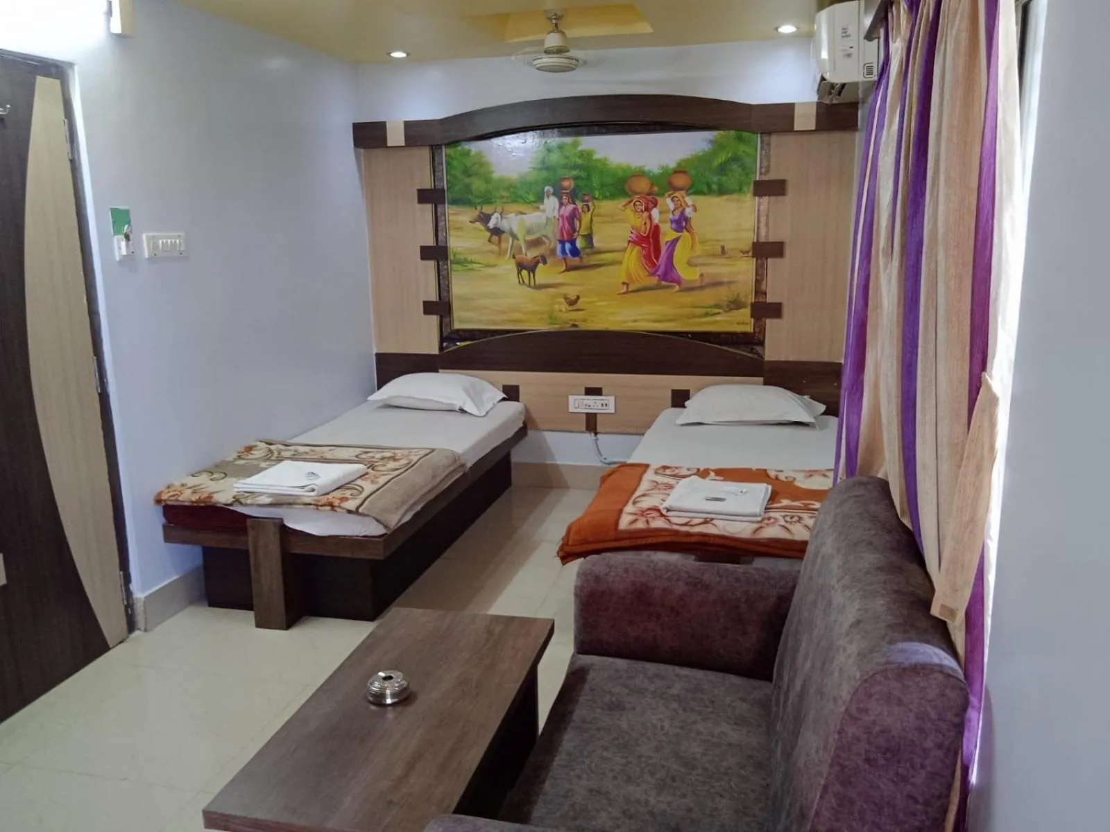 Bed in Hotel Srikrishna International