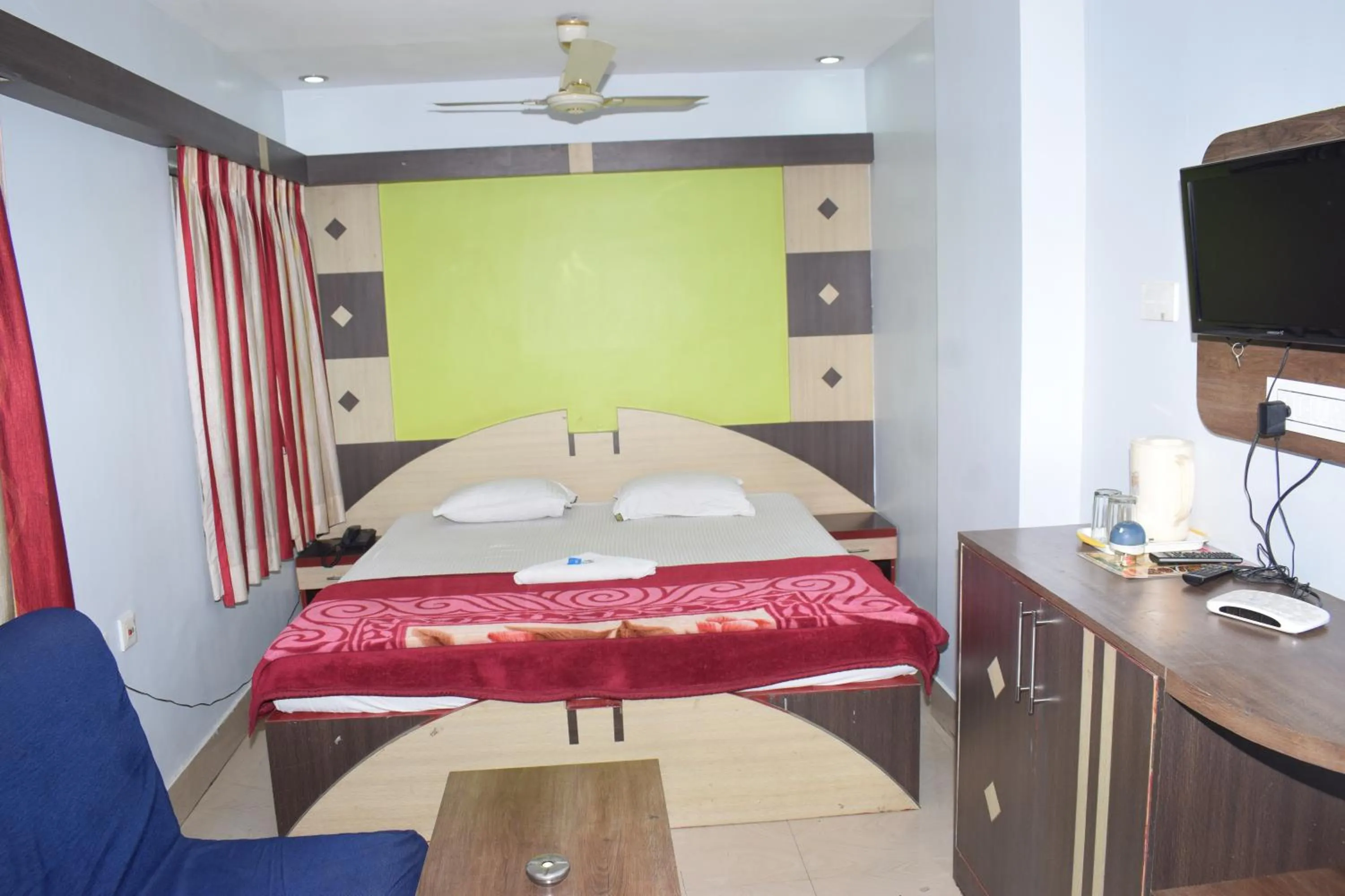 Bed in Hotel Srikrishna International