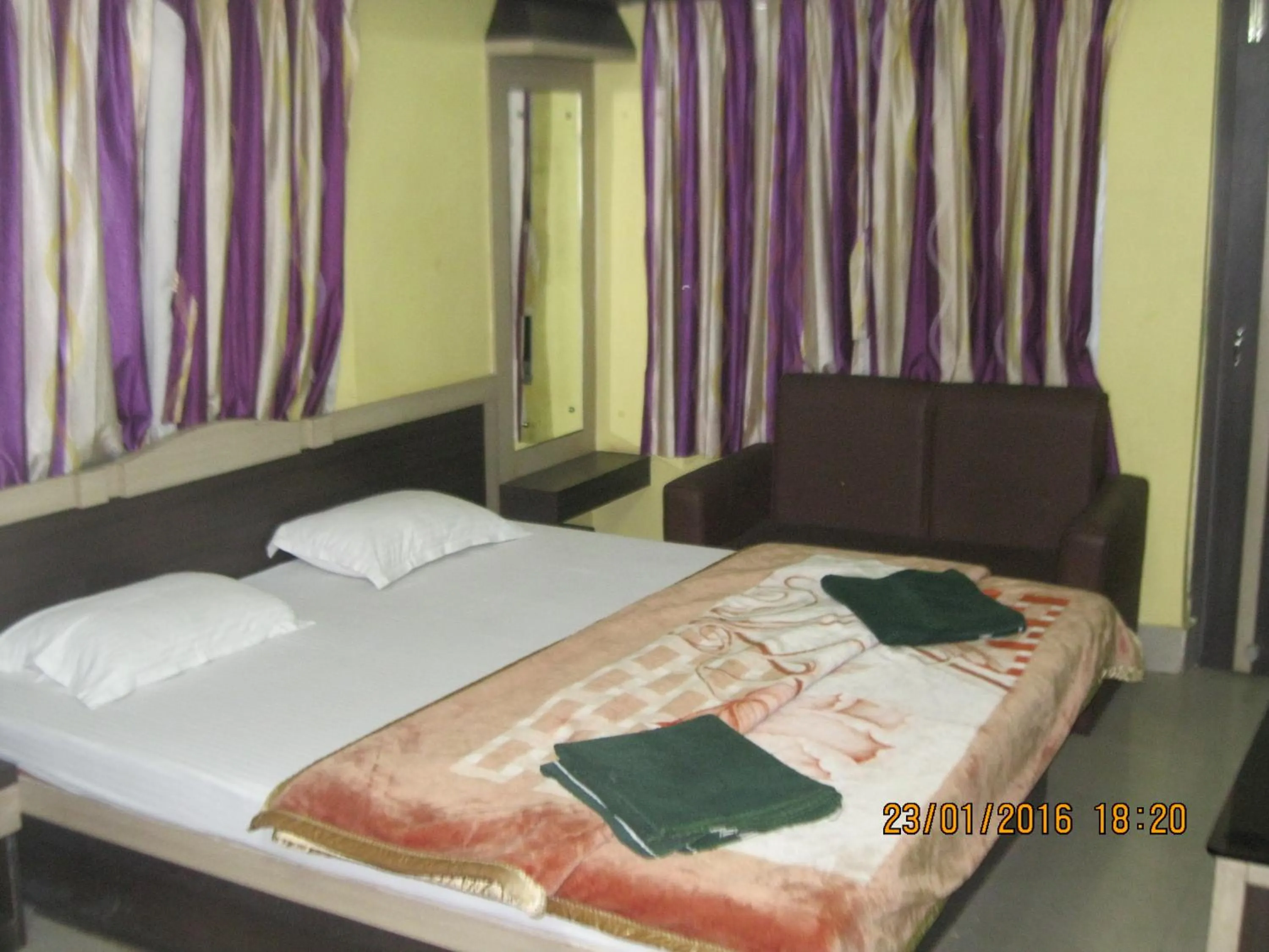 Bed in Hotel Srikrishna International