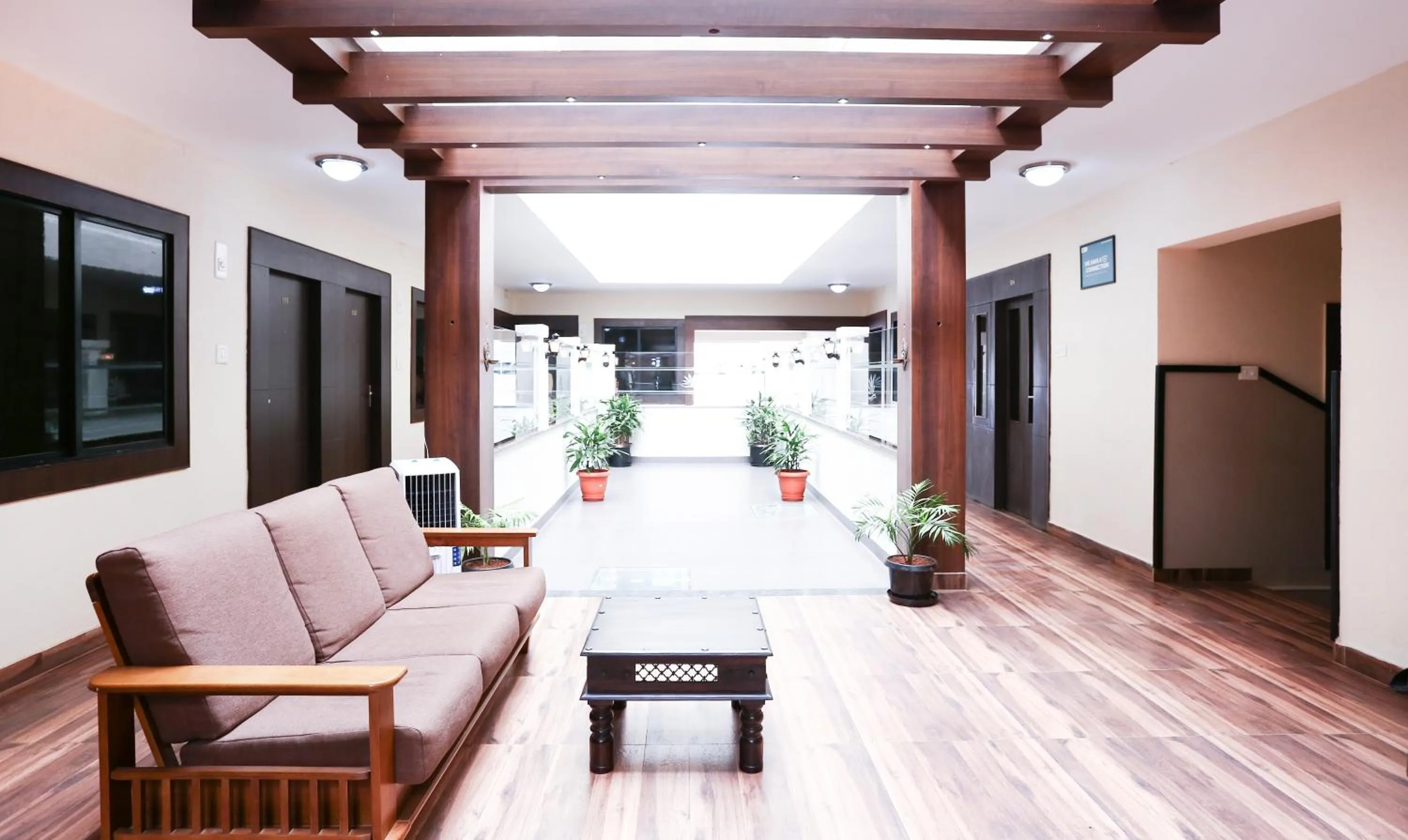Seating area in Treebo Comforts Inn, University Road Deralakatte