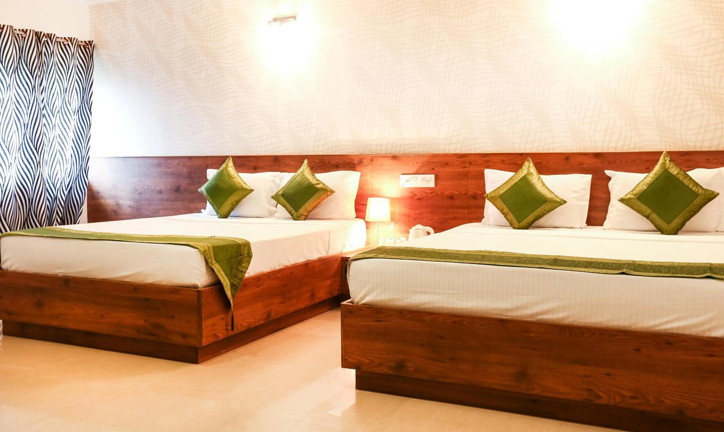 Bedroom, Bed in Treebo Comforts Inn, University Road Deralakatte