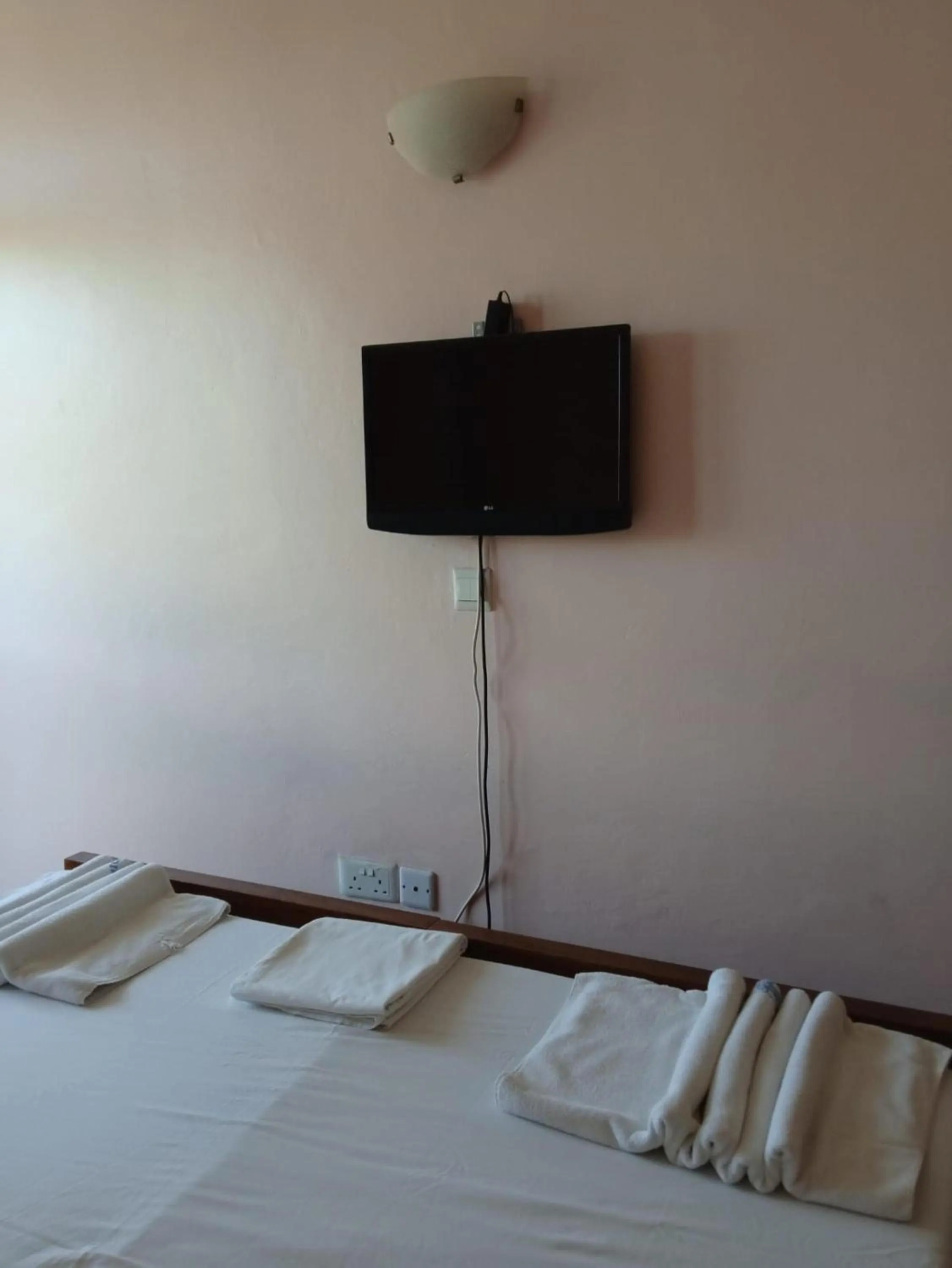 TV and multimedia in Checkpoint Inn Hotel, Mombasa