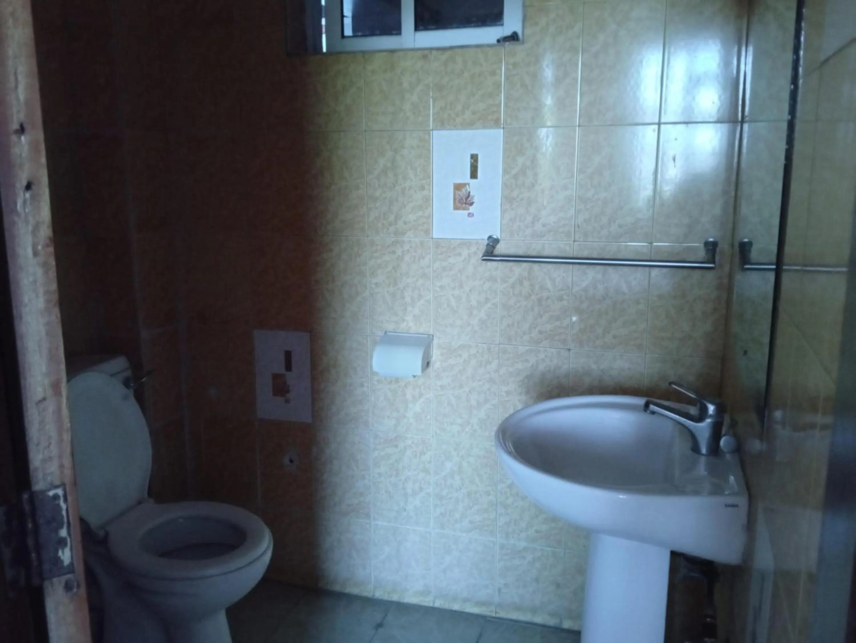 Toilet in Checkpoint Inn Hotel, Mombasa