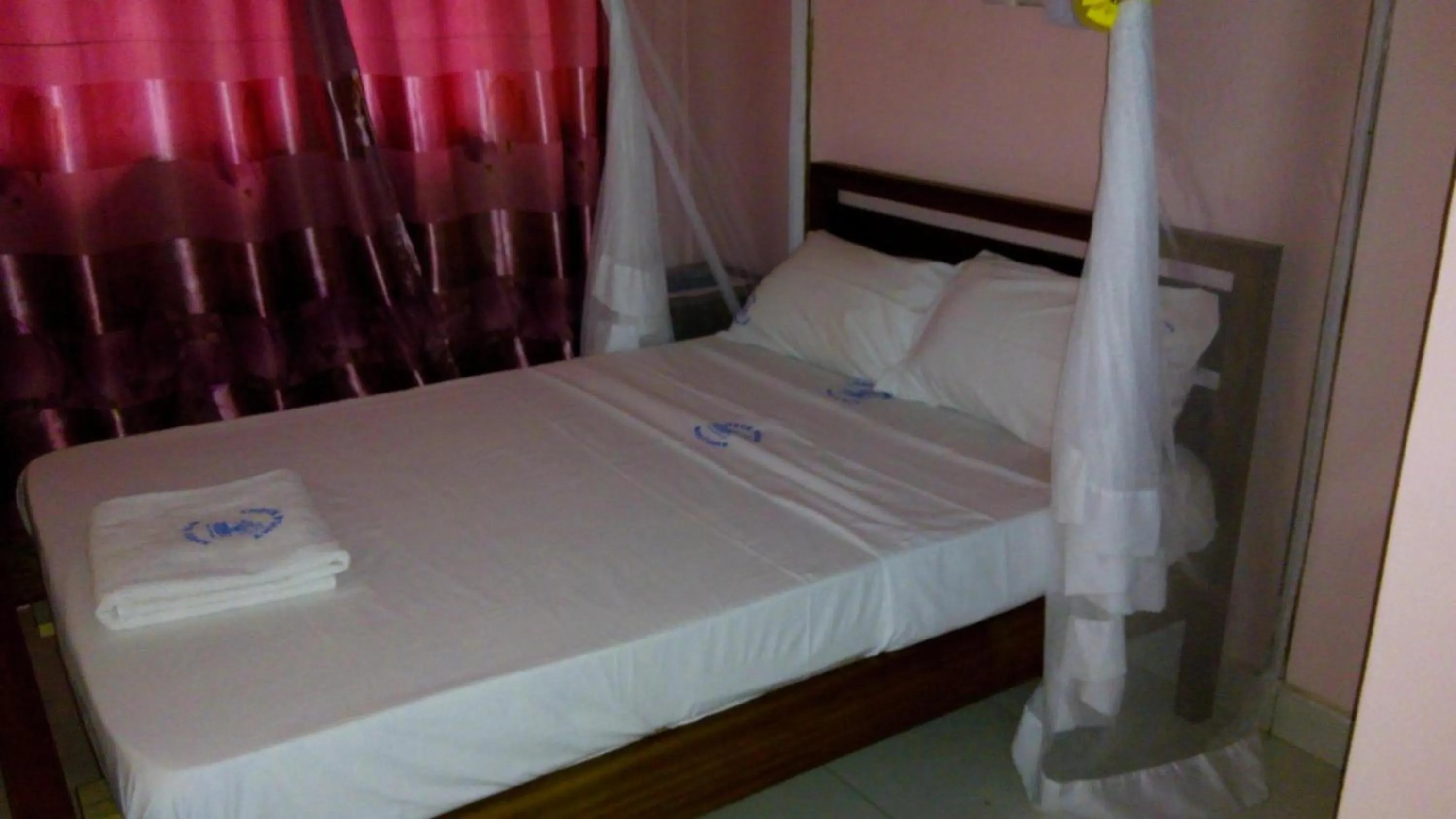 Bed in Checkpoint Inn Hotel, Mombasa