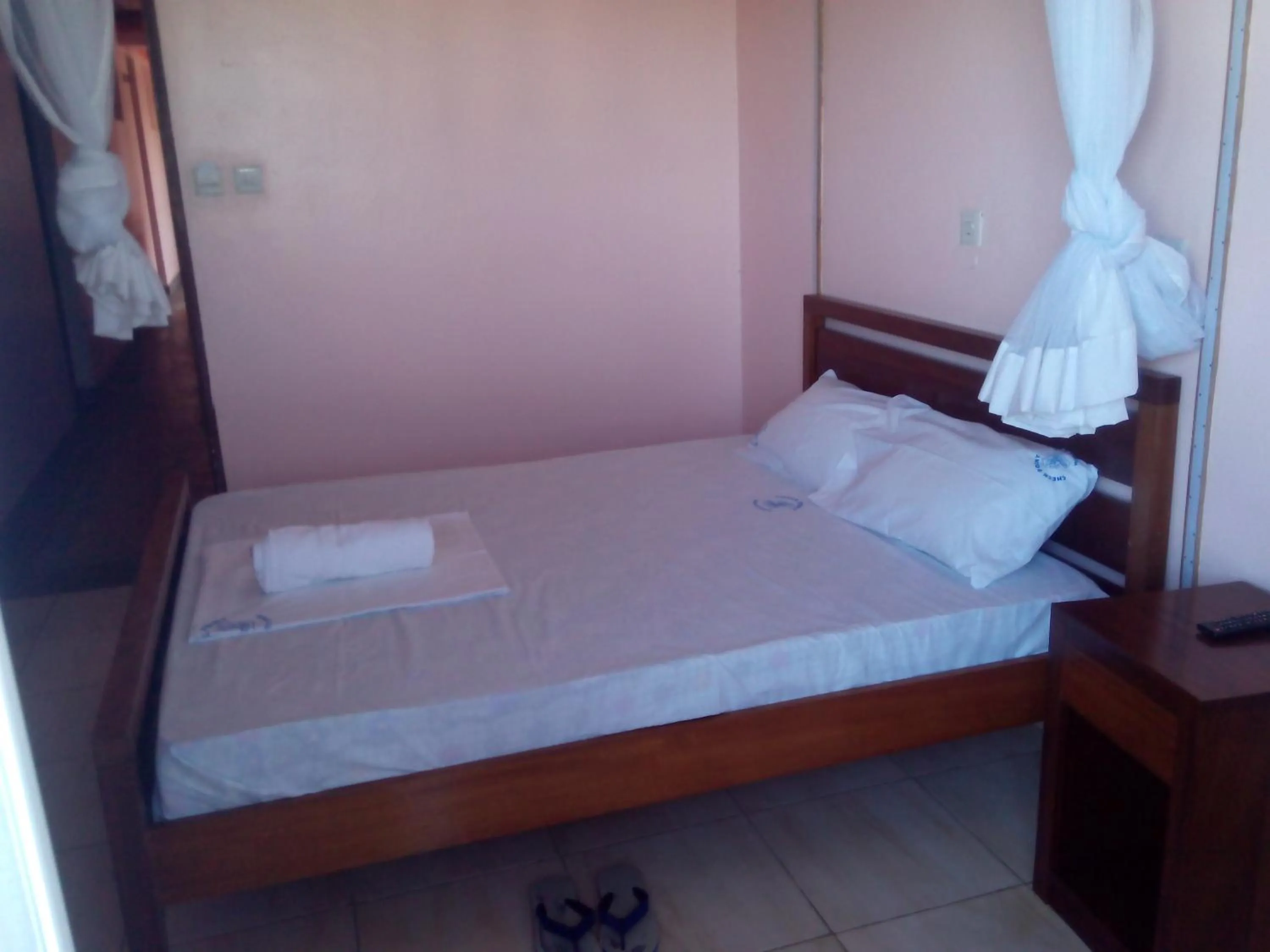 Bed in Checkpoint Inn Hotel, Mombasa