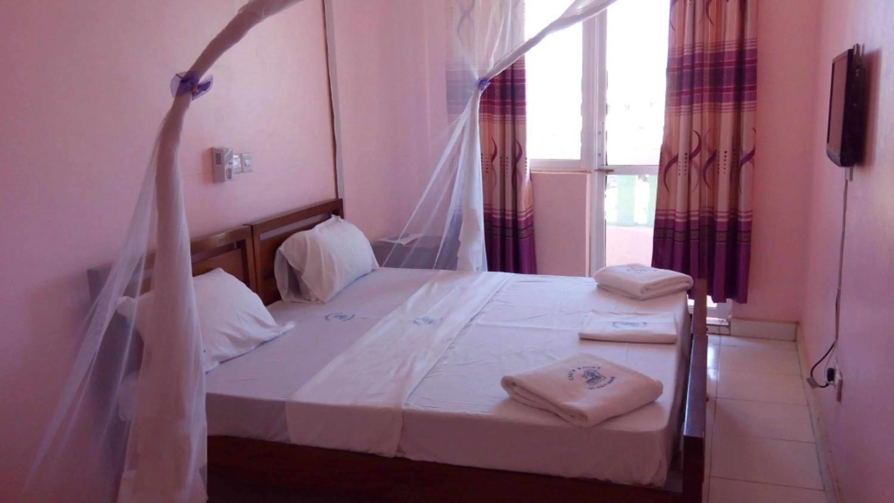 Bed in Checkpoint Inn Hotel, Mombasa