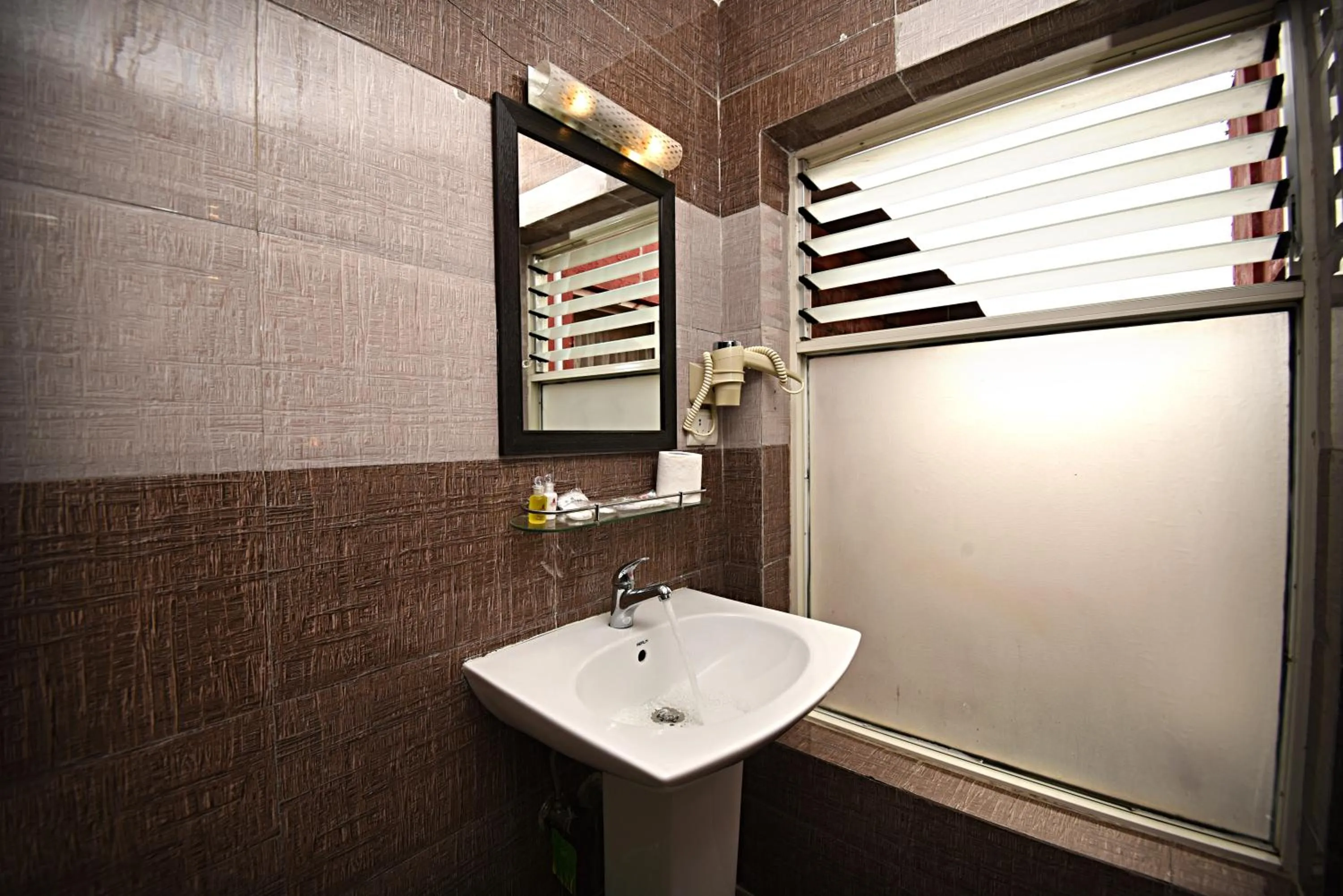 Bathroom in DOM Himalaya Hotel