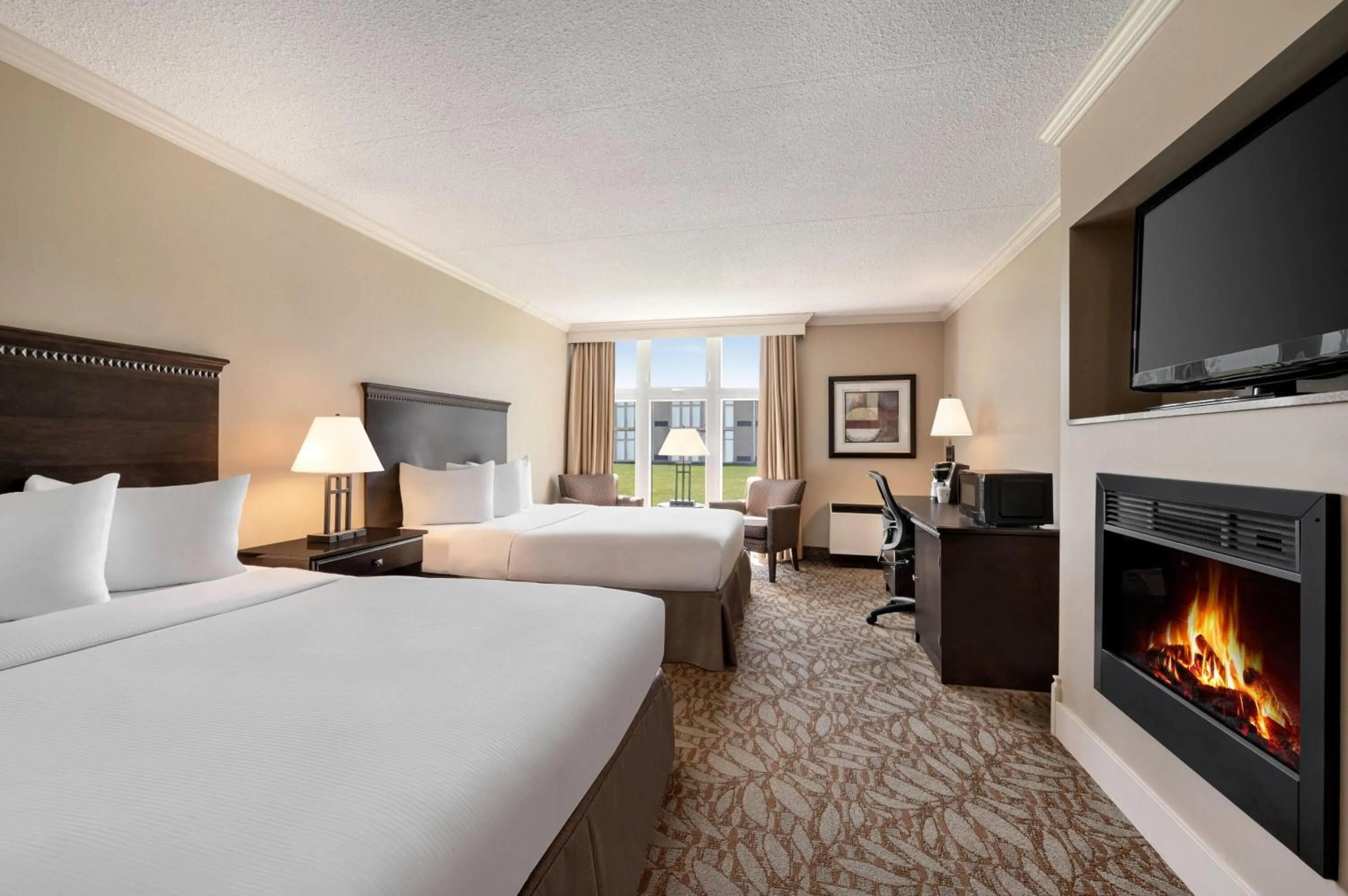 Photo of the whole room, Bed in Ramada by Wyndham Cornwall