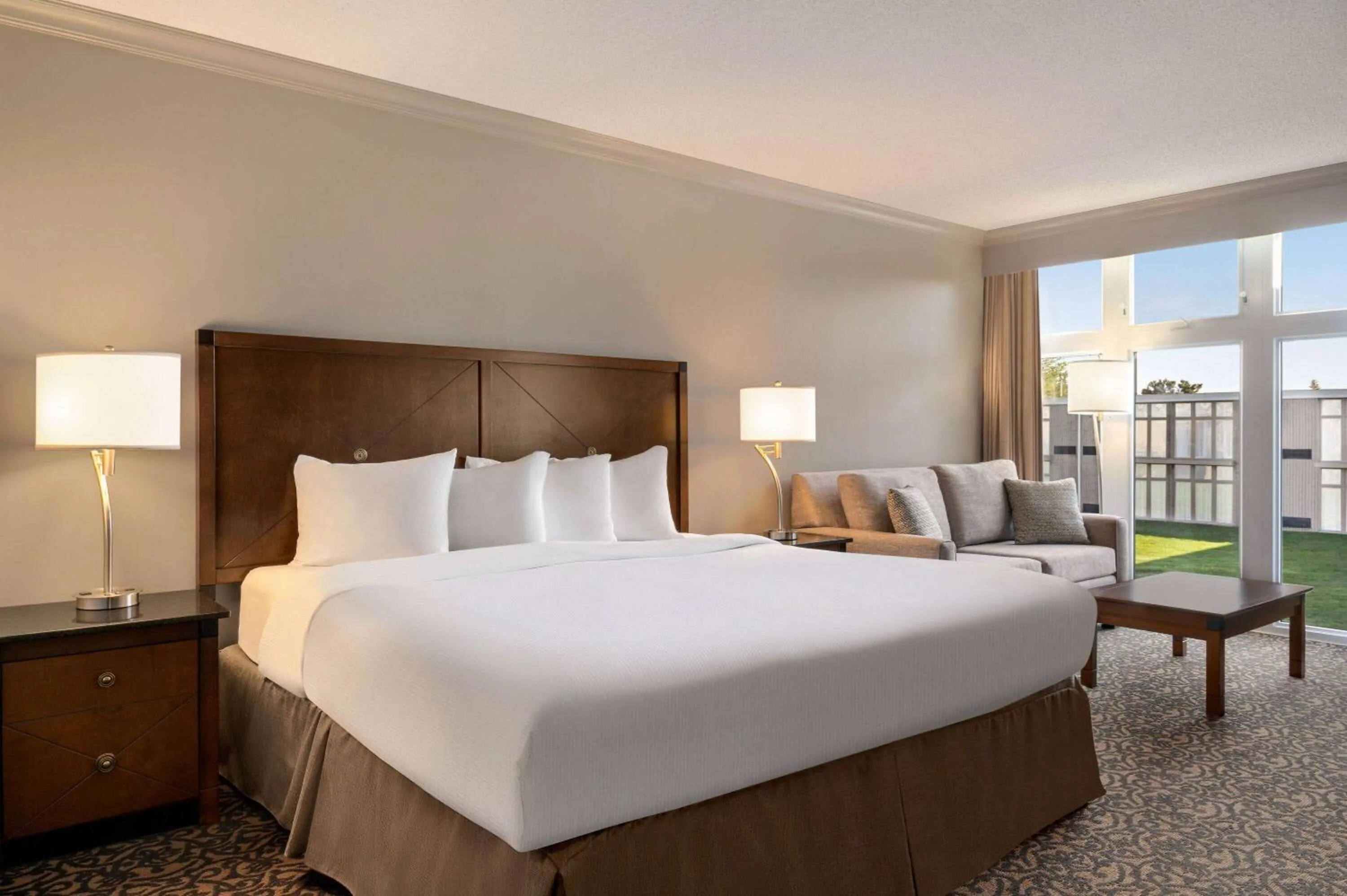 Photo of the whole room, Bed in Ramada by Wyndham Cornwall