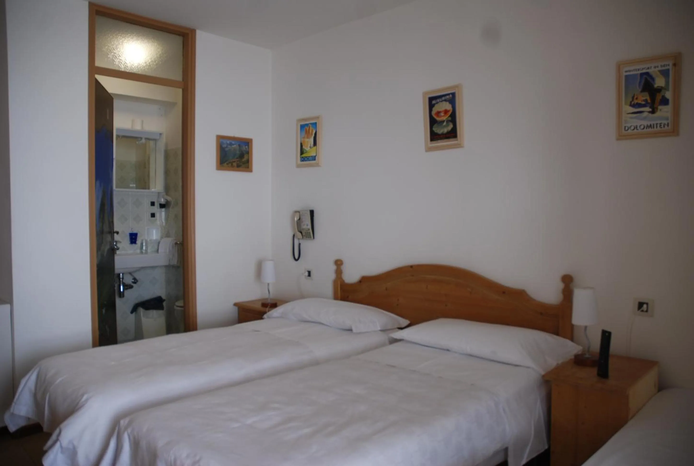 Bed in Hotel Dolomiti Des Alpes
