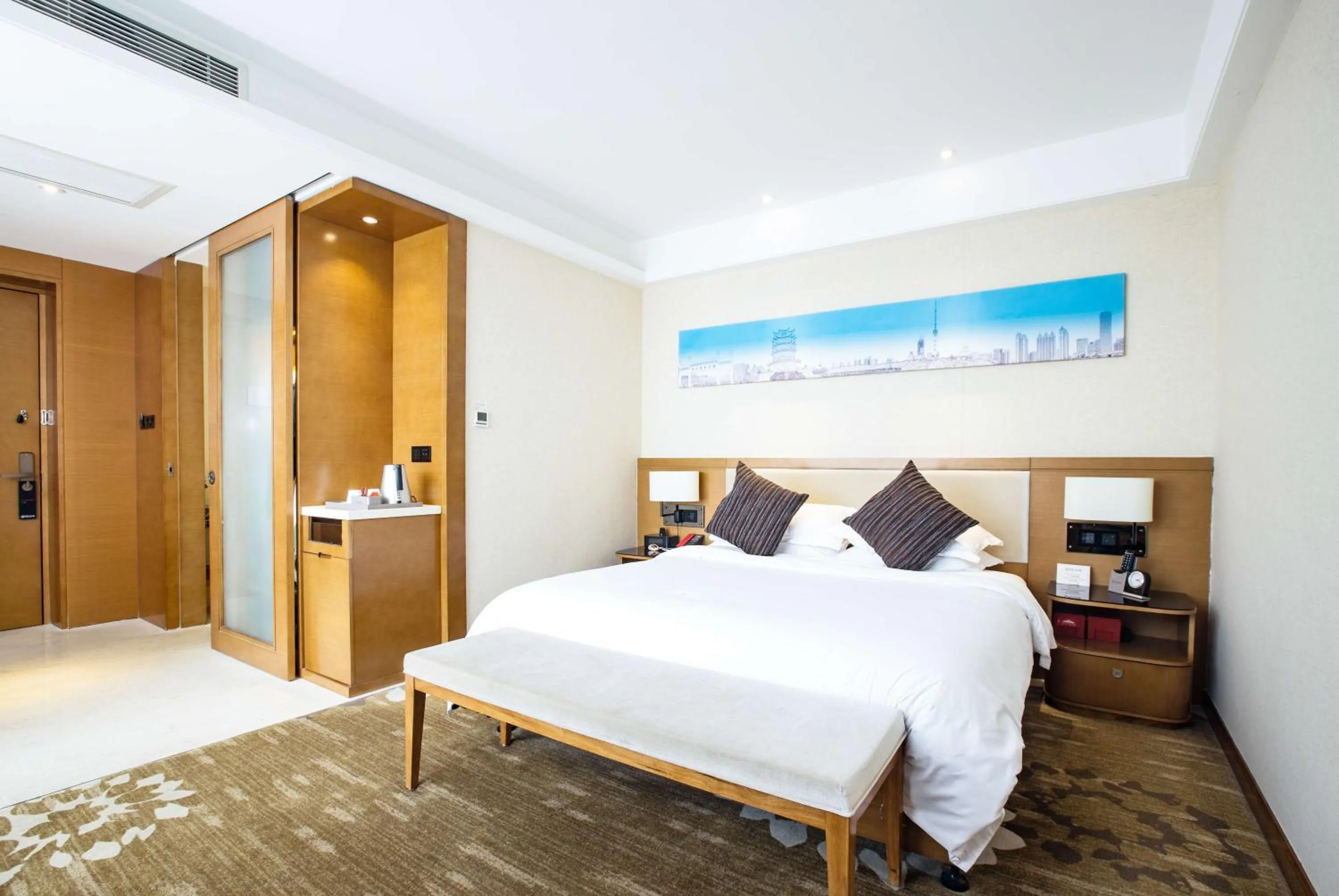 Bed in Ramada Encore Wuhan