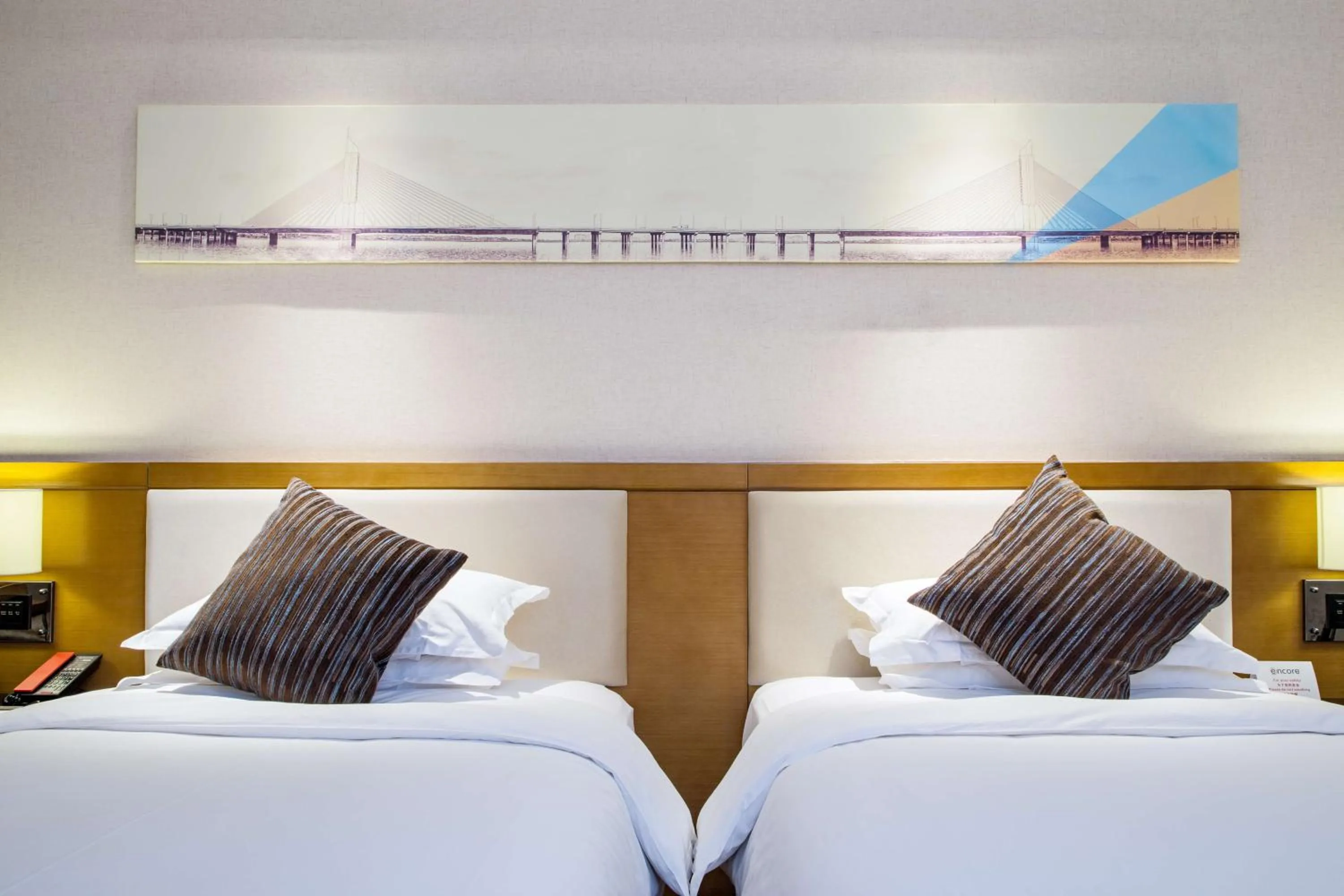 Bed in Ramada Encore Wuhan