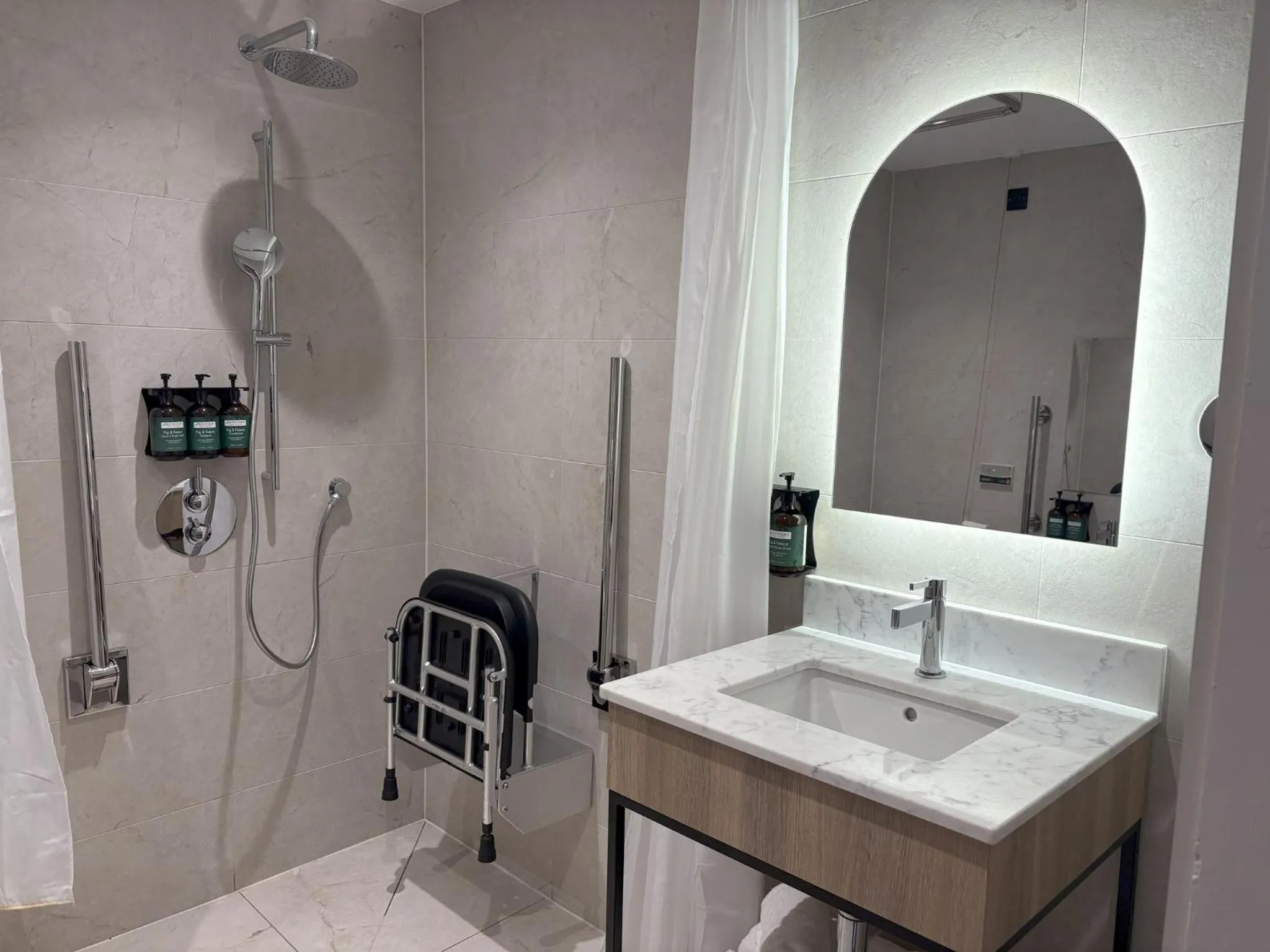 Bathroom in voco Rockingham Forest Corby by IHG