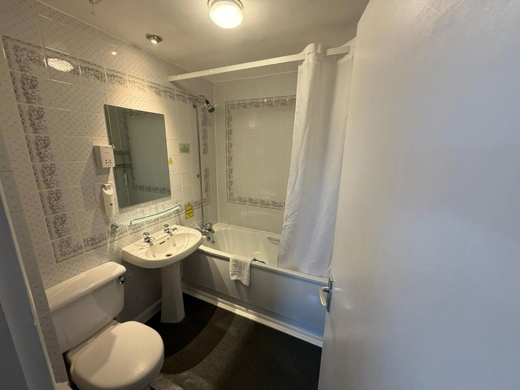 Bathroom in Raven Hotel by Greene King Inns