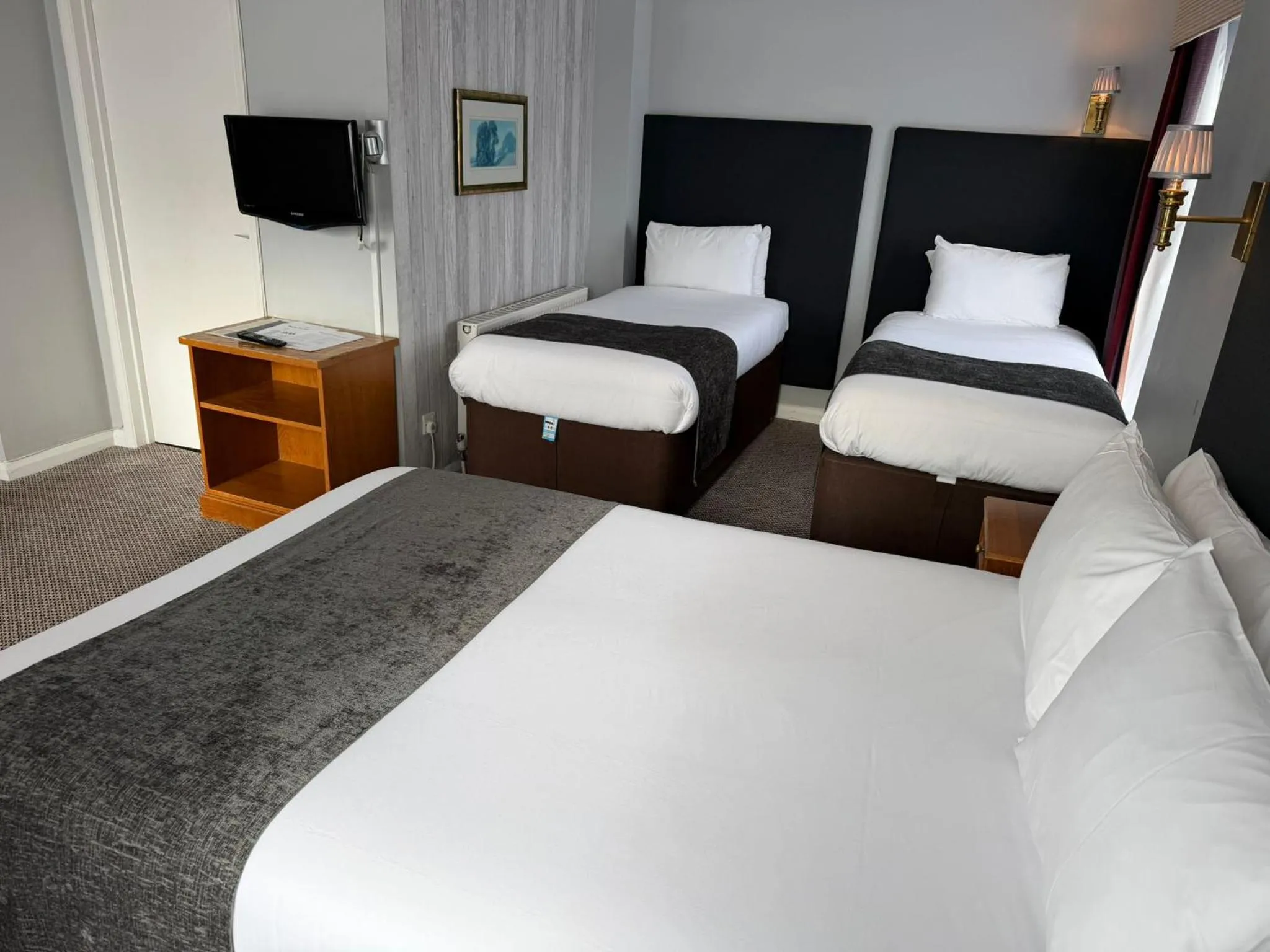 Bed in Raven Hotel by Greene King Inns