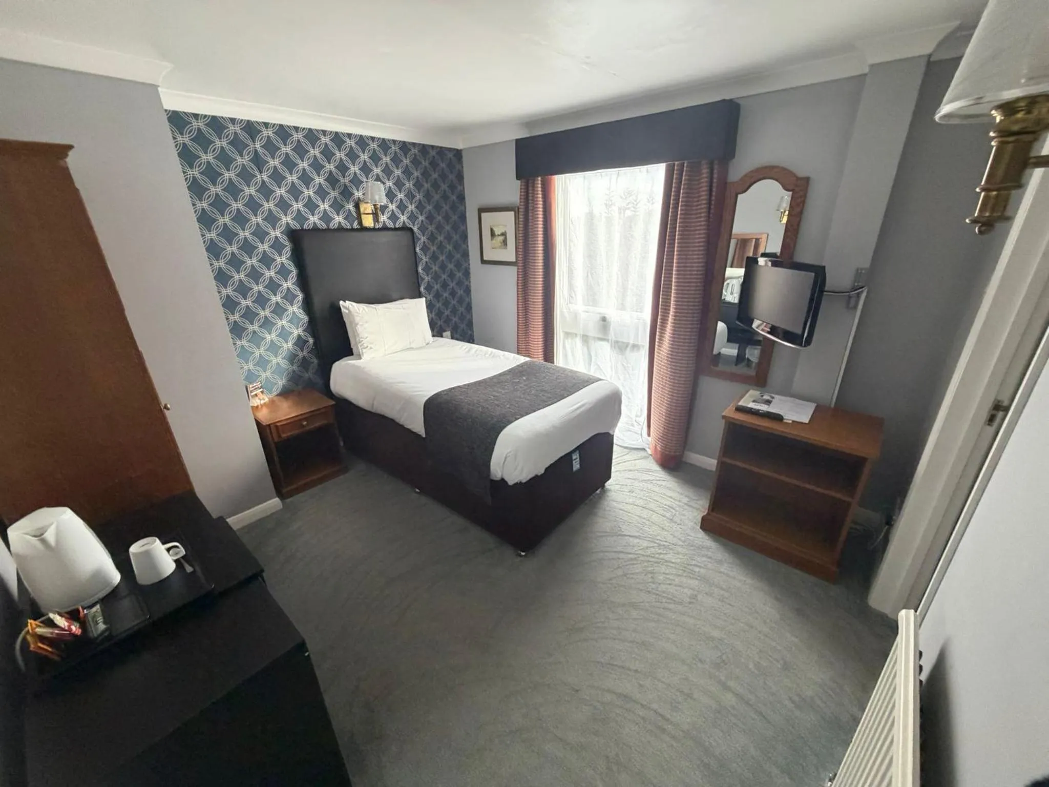 Bed in Raven Hotel by Greene King Inns