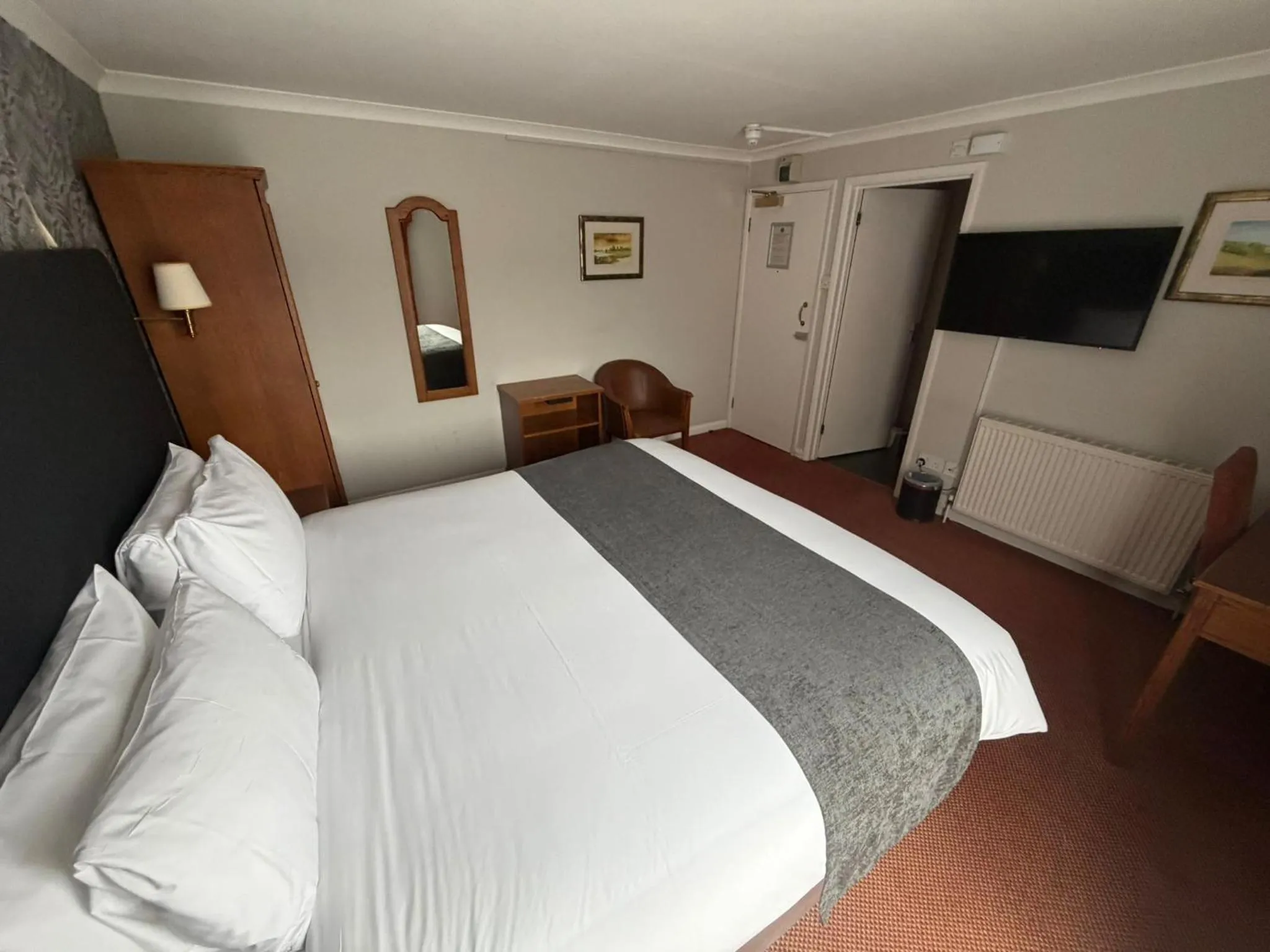 Bed in Raven Hotel by Greene King Inns