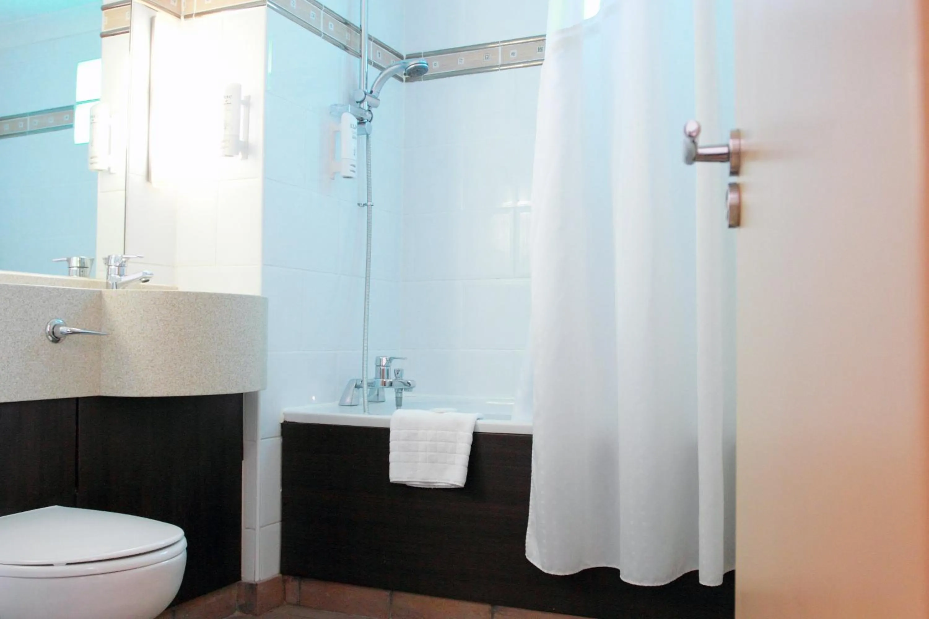 Bathroom in Holiday Inn A55 Chester West by IHG