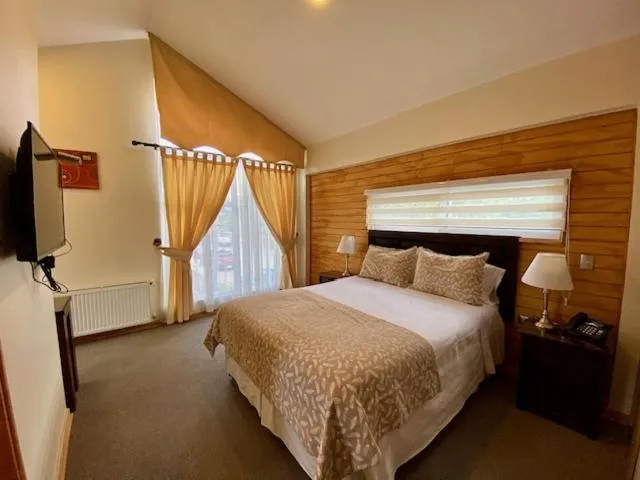 Bed in Madero Aysen ApartHotel