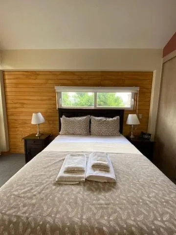 Decorative detail, Bed in Madero Aysen ApartHotel