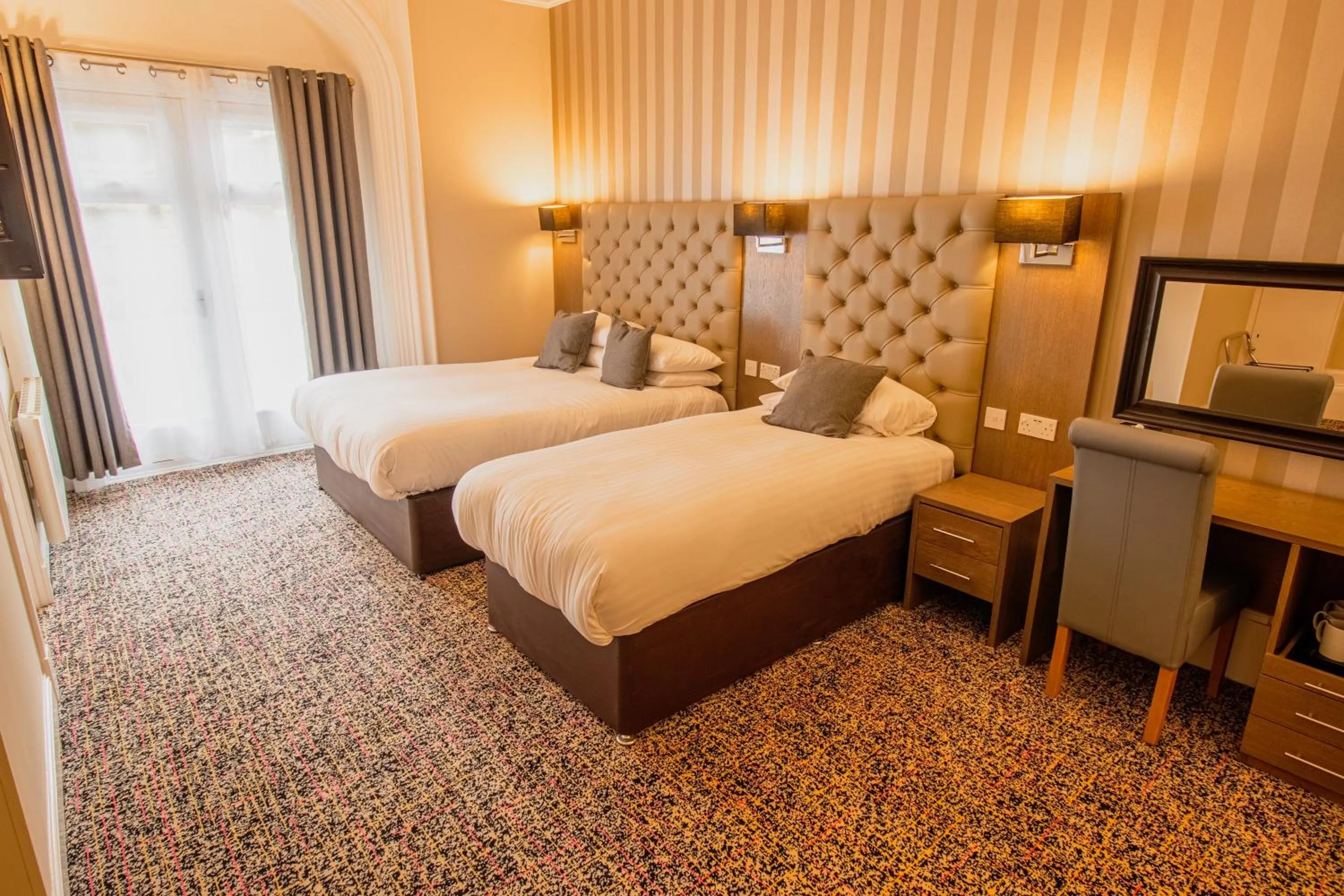 Bedroom, Bed in Ambassador Hotel