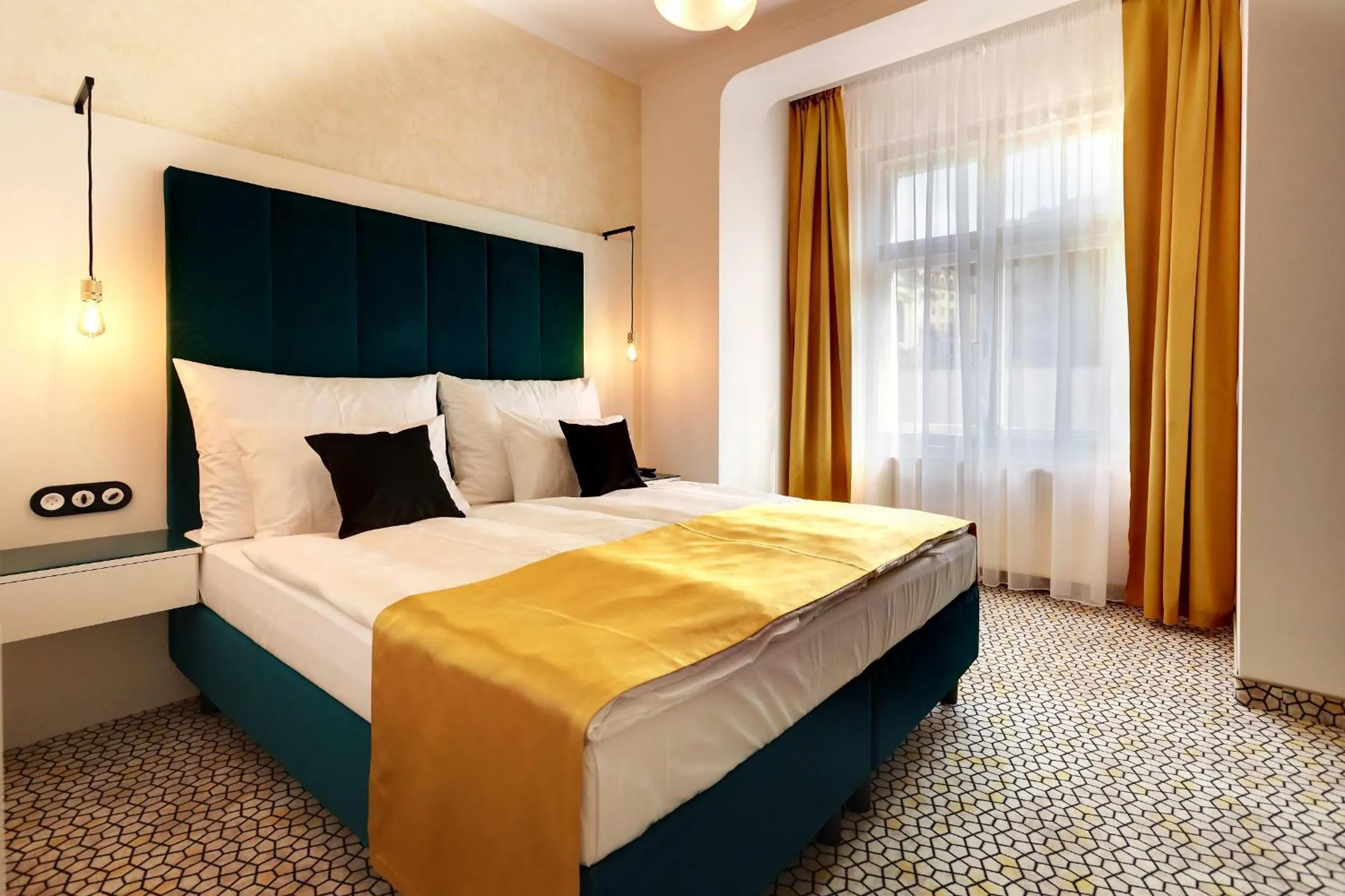 Bed in Art Deco WOLKER by ASTORIA Hotel & Medical Spa