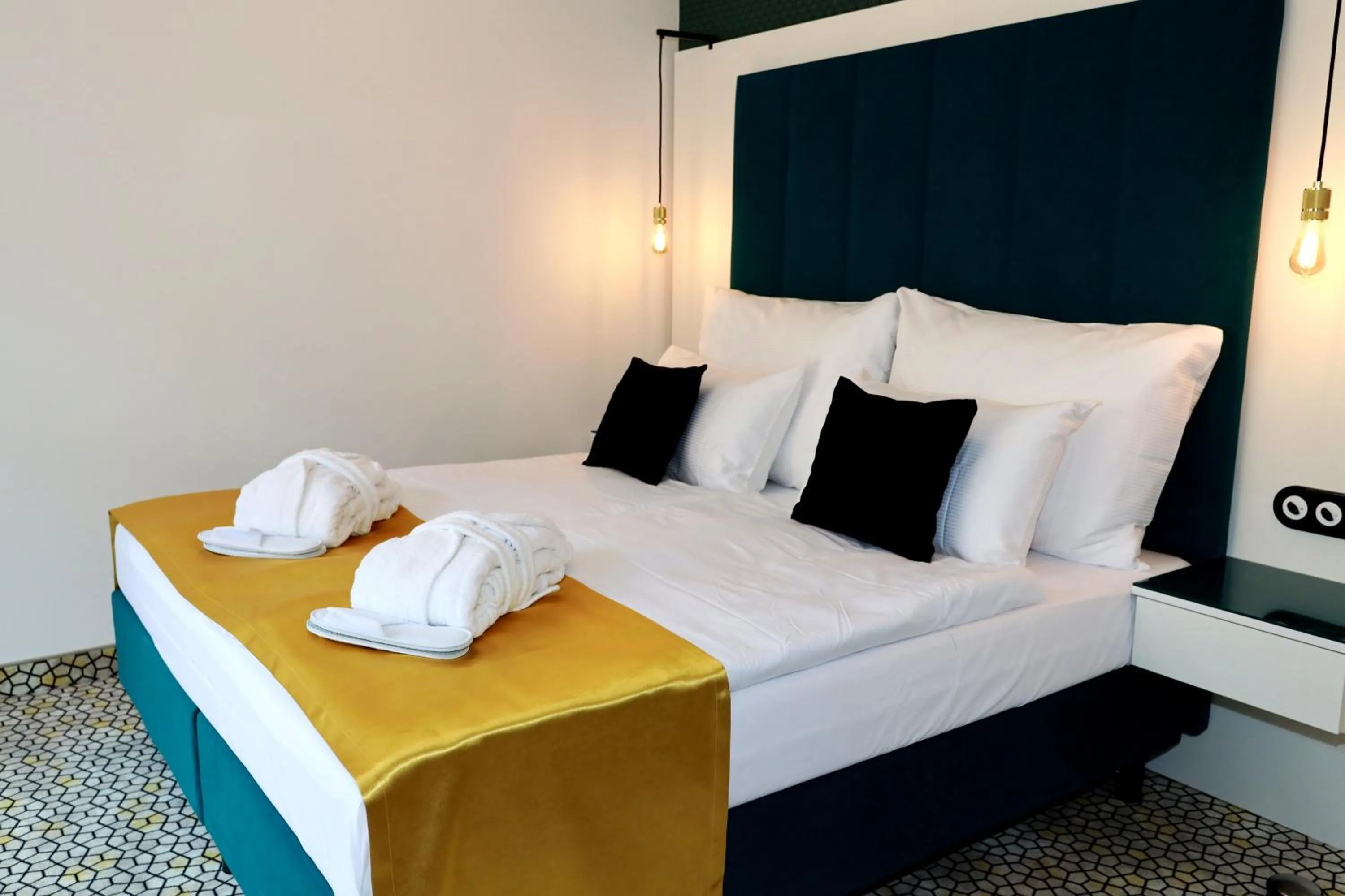 Bed in Art Deco WOLKER by ASTORIA Hotel & Medical Spa