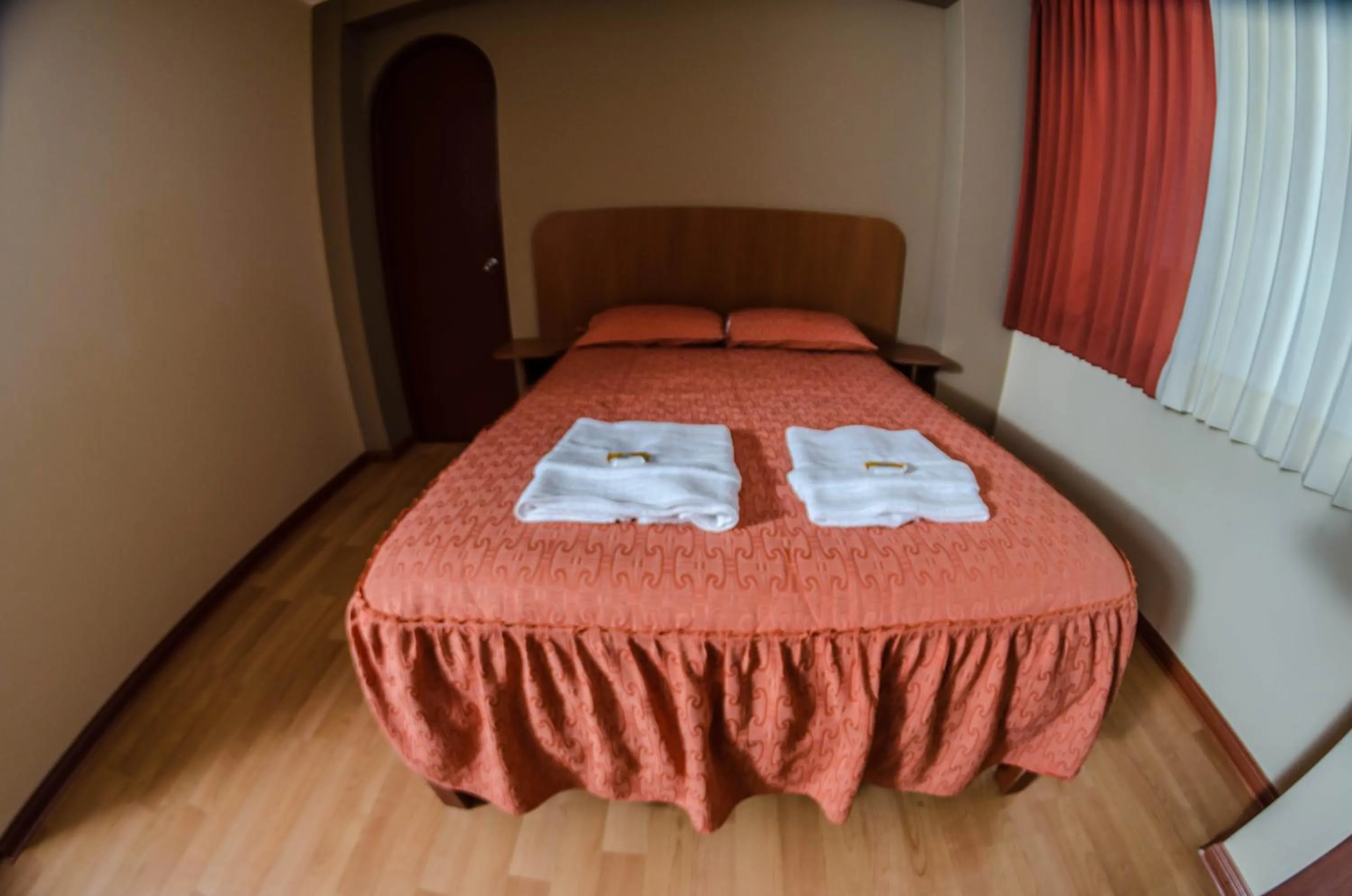 Bed in Hotel Arunta