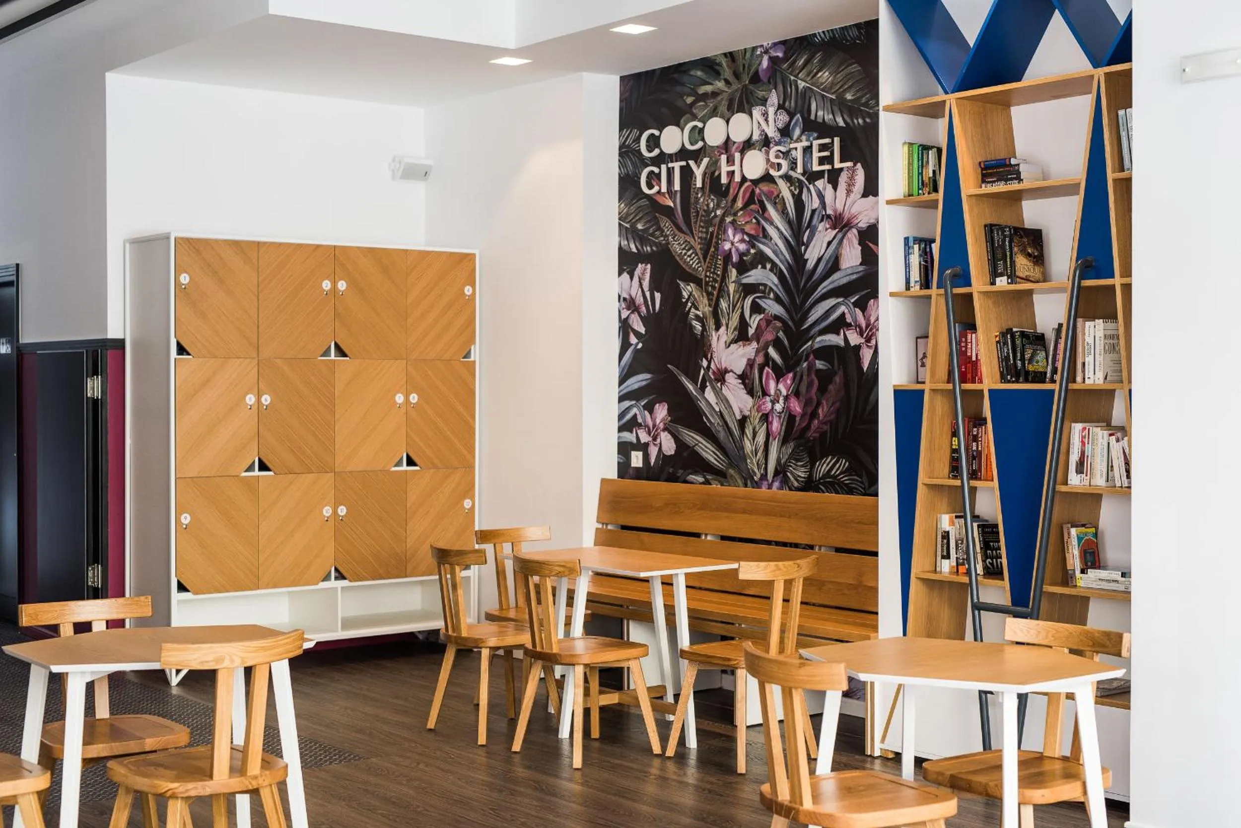 Communal lounge/ TV room in Cocoon City Hostel