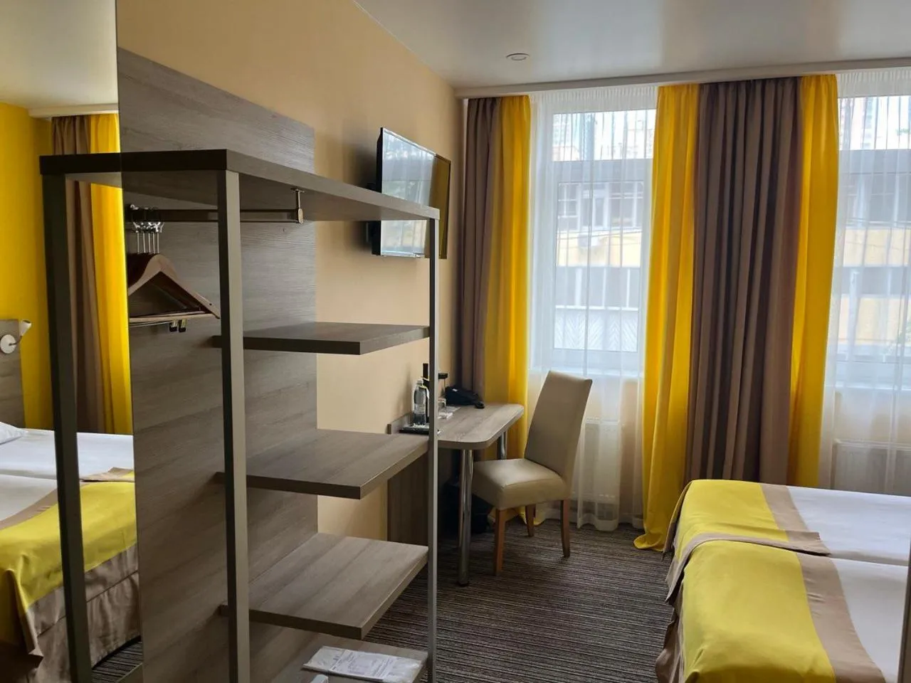 Bed in Raziotel Kyiv Yamska