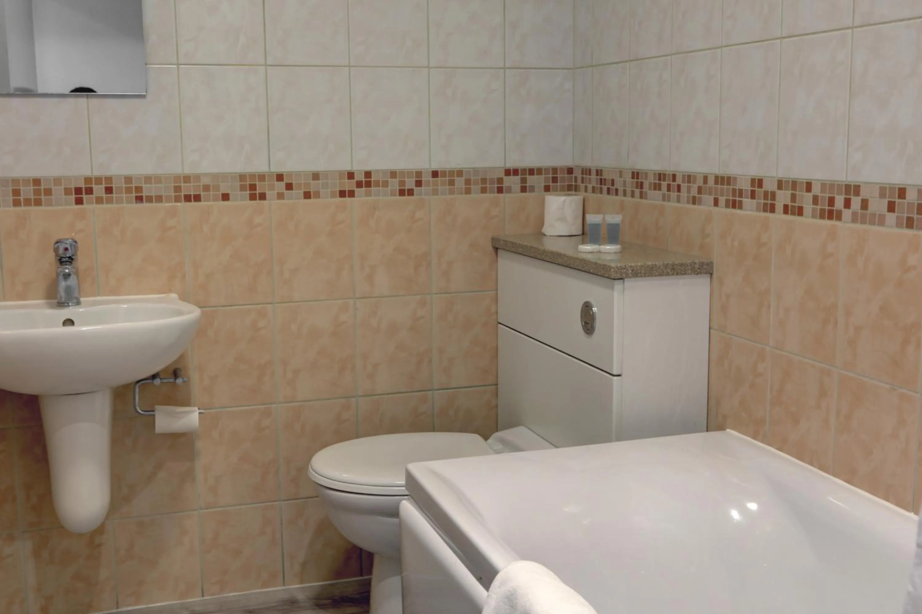 Toilet in Sure Hotel by Best Western Reading