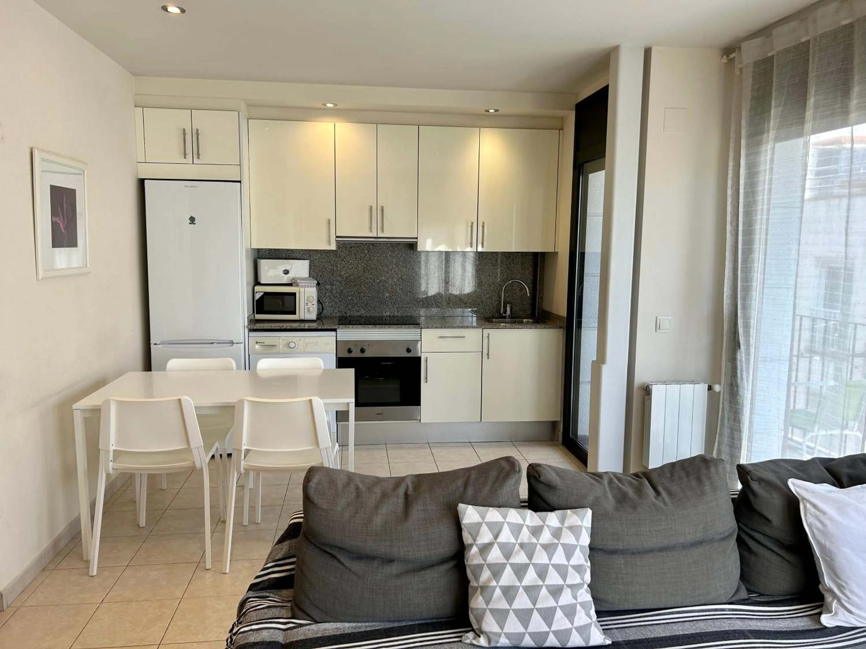 Kitchen or kitchenette in Apartamentos TDM