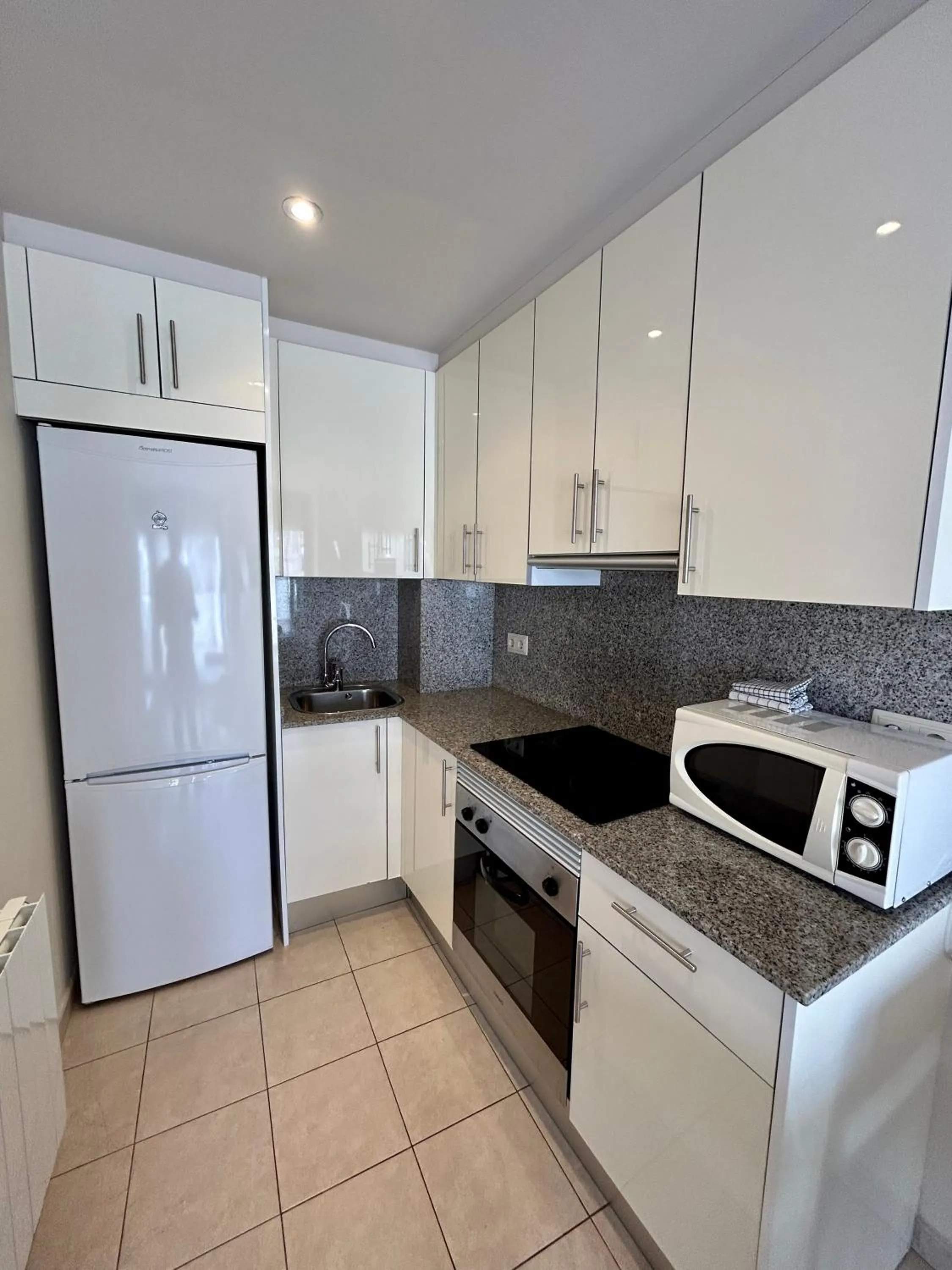 Kitchen or kitchenette in Apartamentos TDM