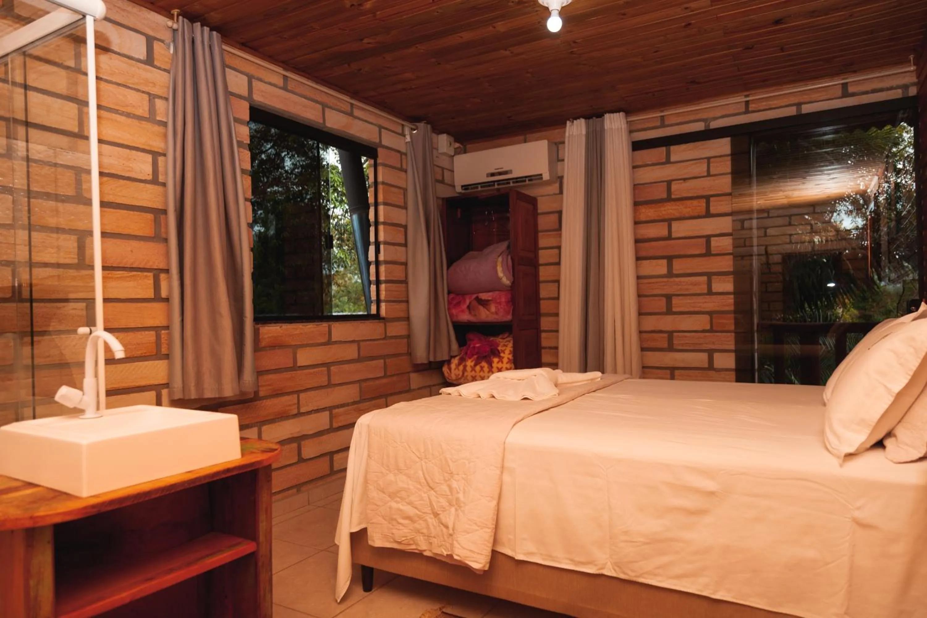 Bed in Pousada Água dos Canyons