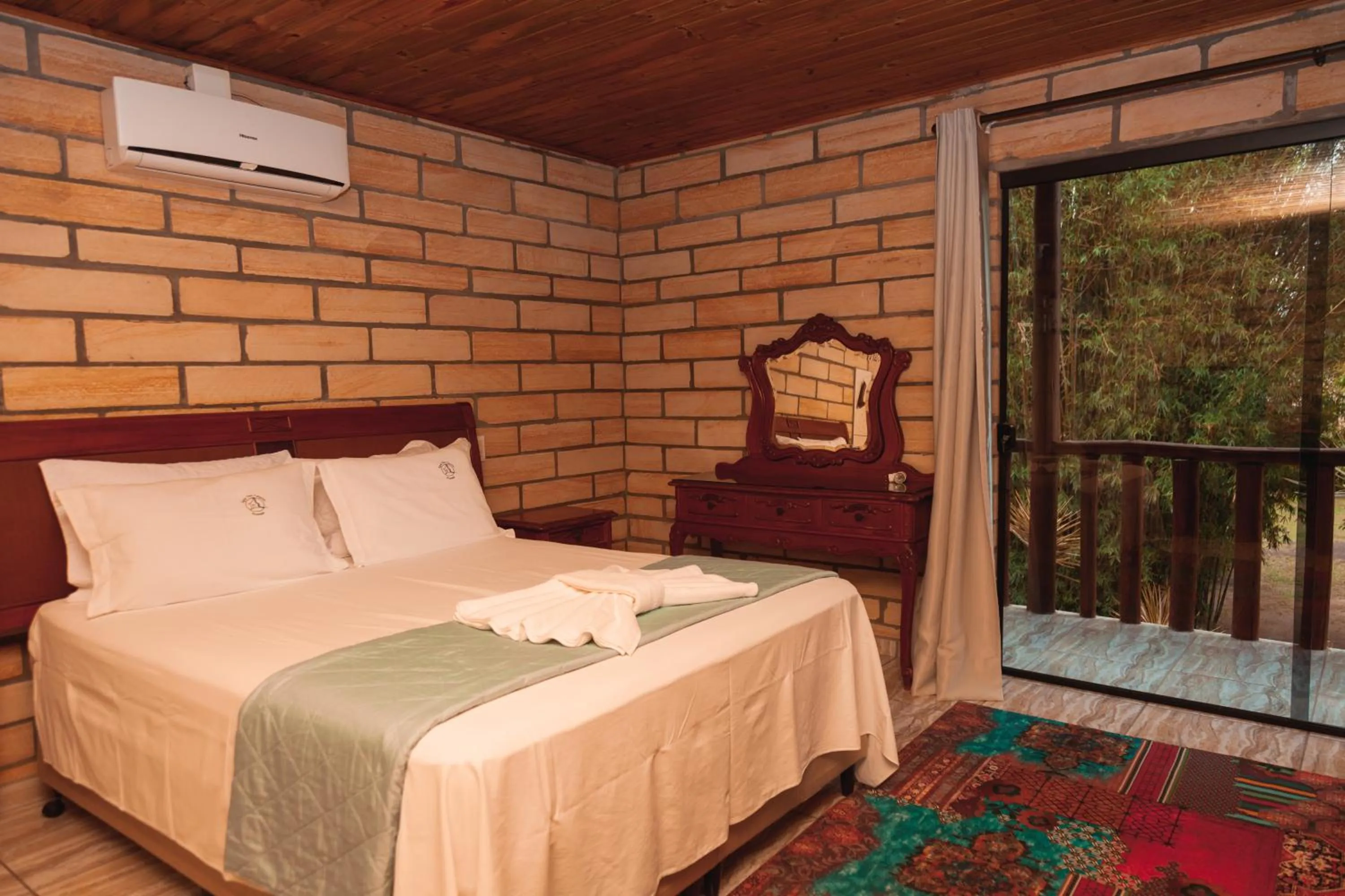 Bed in Pousada Água dos Canyons