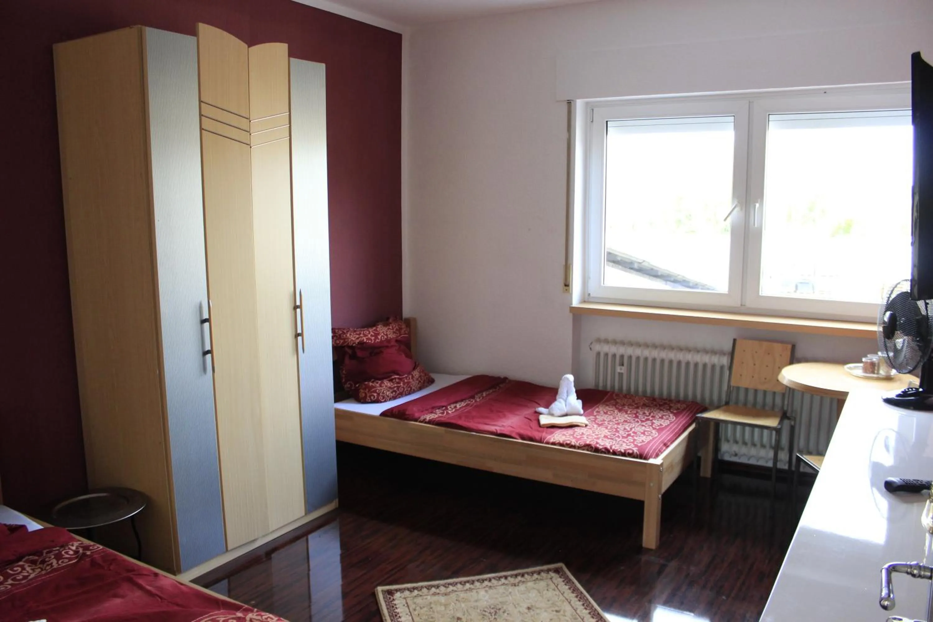 Photo of the whole room, Bed in Die Werkstatt