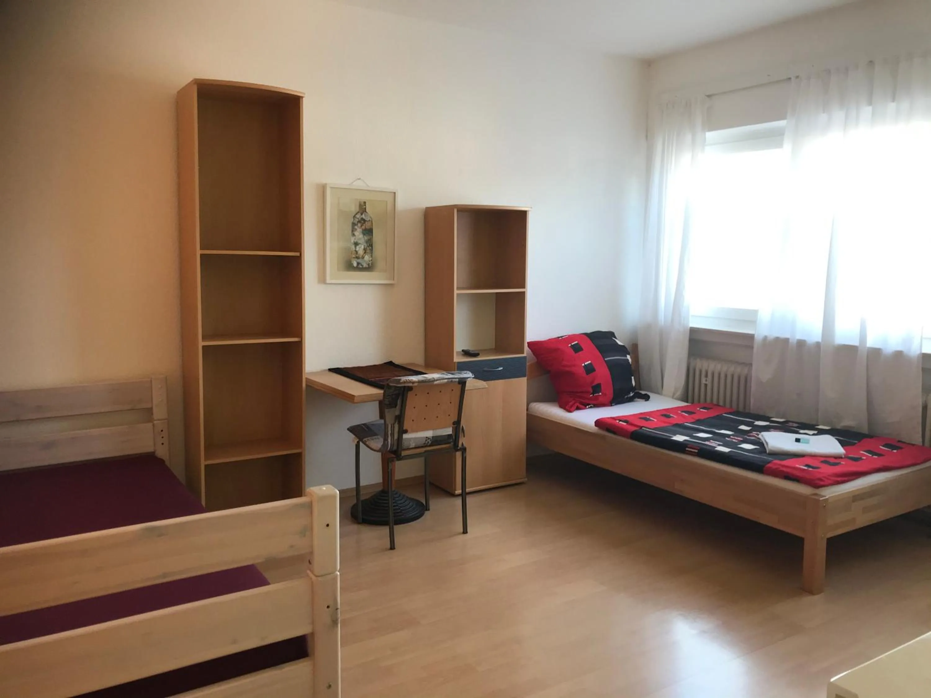 Photo of the whole room, Bed in Die Werkstatt