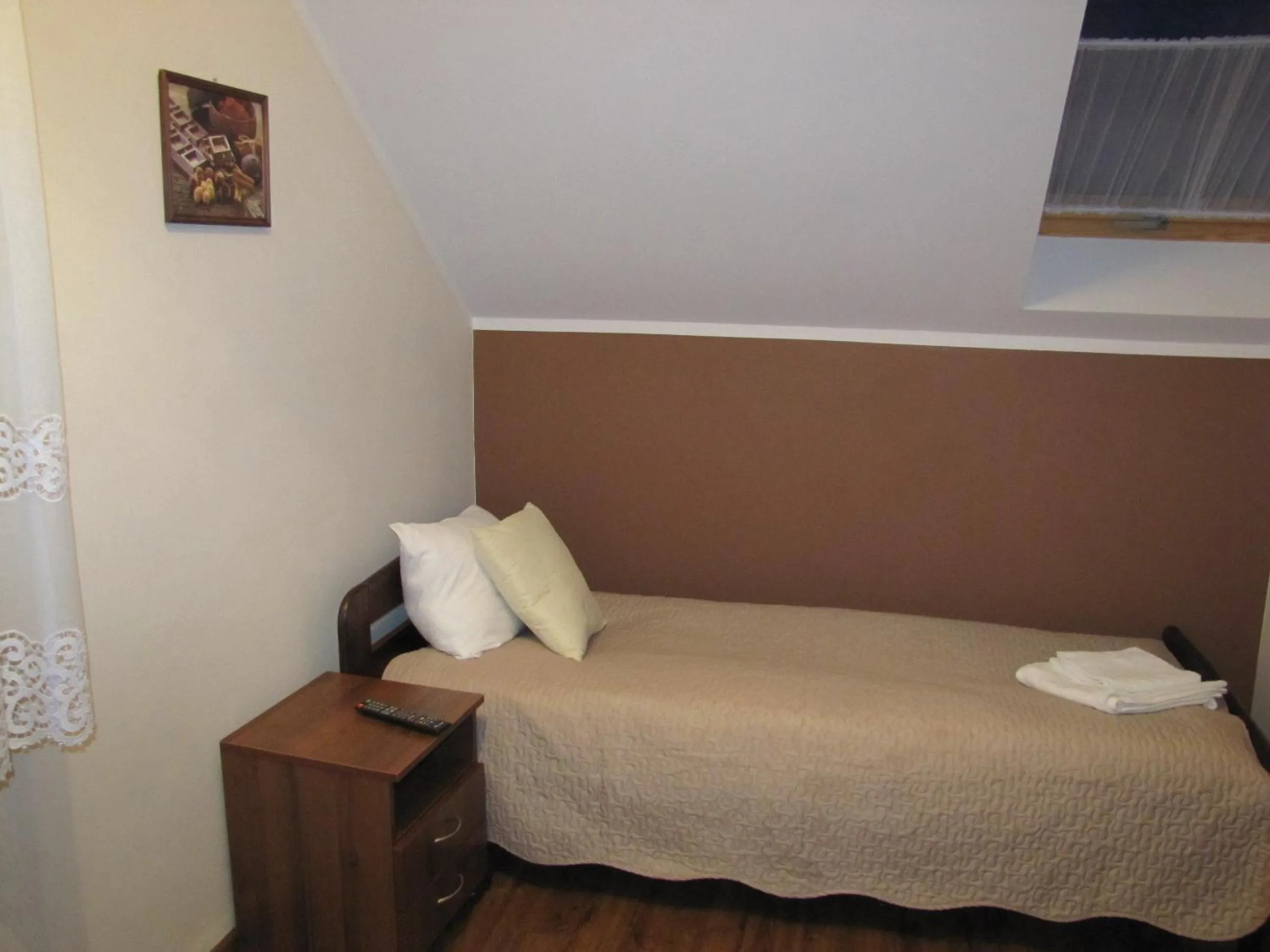 Photo of the whole room, Bed in Heveliusz