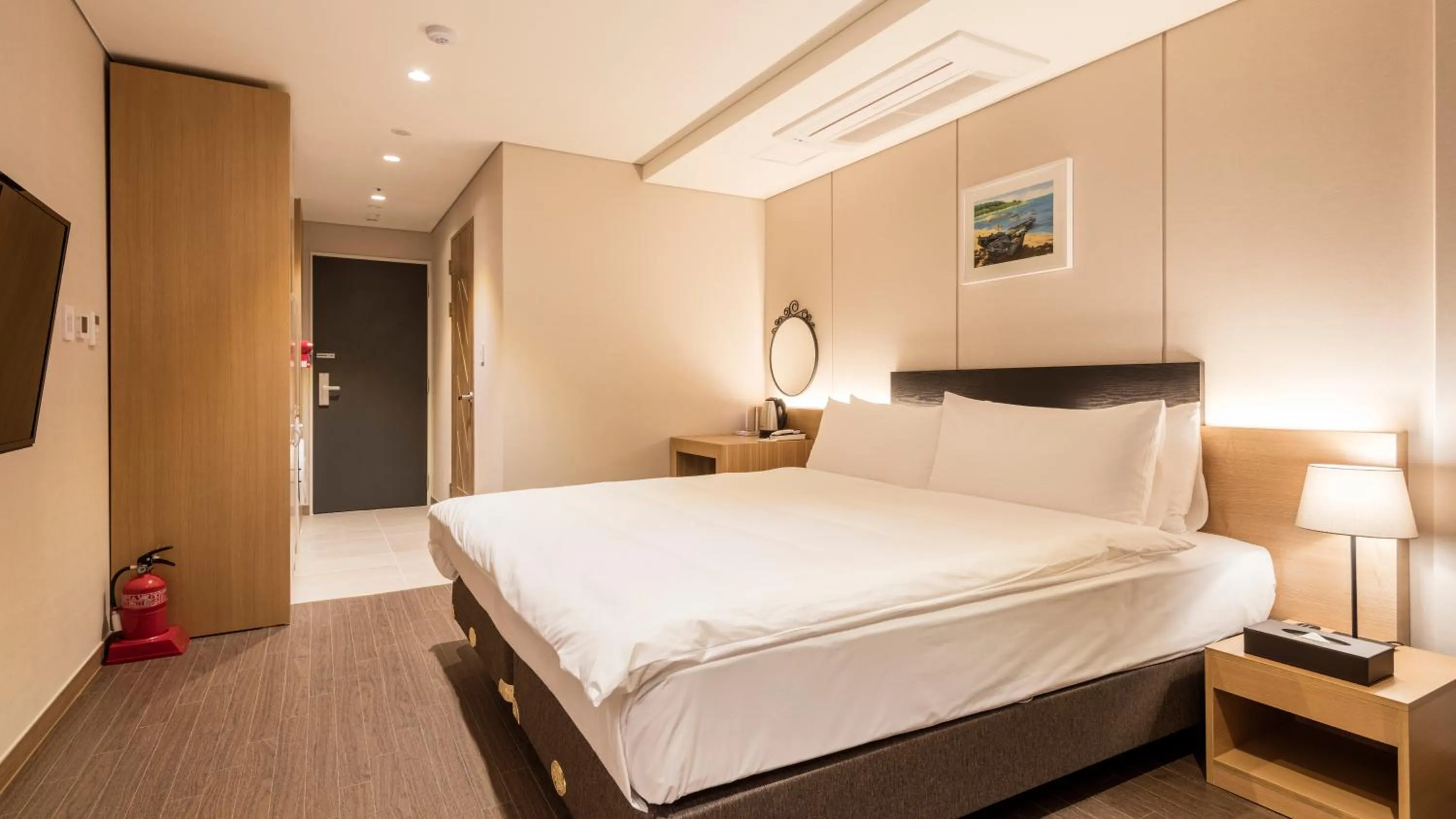 Bed in The First Stay Hotel