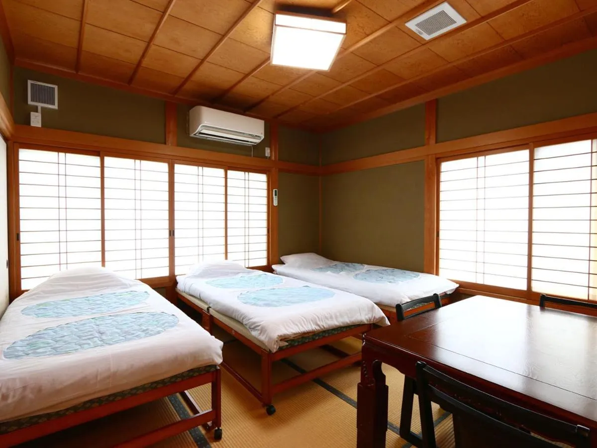 Bed in Minshuku Ryokan Kawai